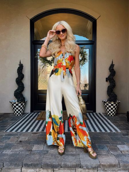 FRESH BEGINNINGS IVORY MULTI PRINT STRAPLESS JUMPSUIT (size S) / Gold Metallic Heels / Bubble Cat eye Sunglasses / Gold Knot Amazon Purse 

#LTKstyletip #LTKfindsunder50 #LTKfindsunder100