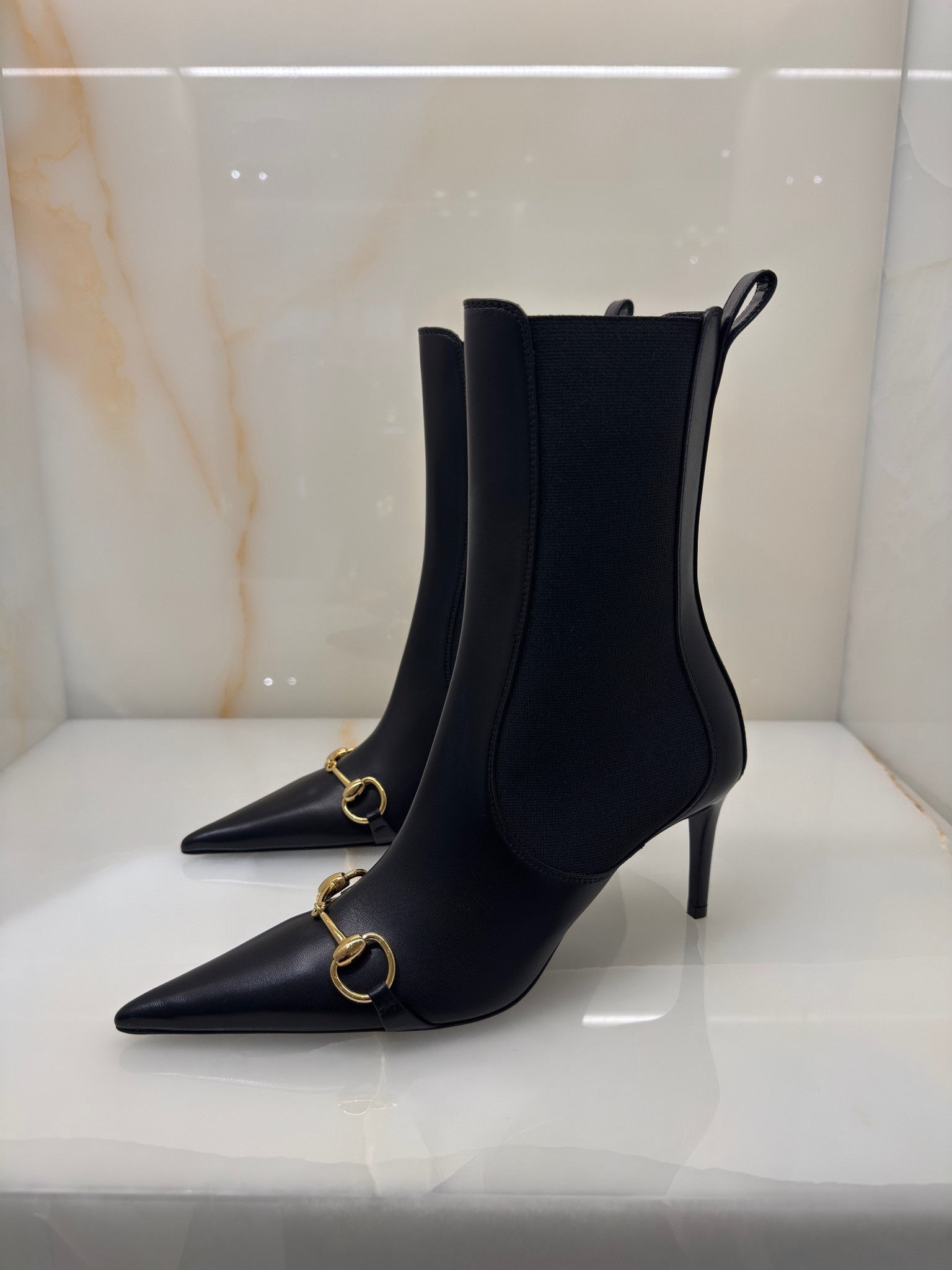 Found these while sourcing for a client and had to share 👀 Gucci's Donna ankle boot is THAT boot — pointed toe, sky-high stiletto, and the horsebit hardware doing exactly what it should. Black leather, elevated, done. They're on pre-order at Neiman Marcus right now (shipping by 12/7) so if you want them for winter, get ahead of it. 🖤

#gucci #neimanmarcus #anklebootss #falllooks #designershoes #LTKshoes #liketkit 

 