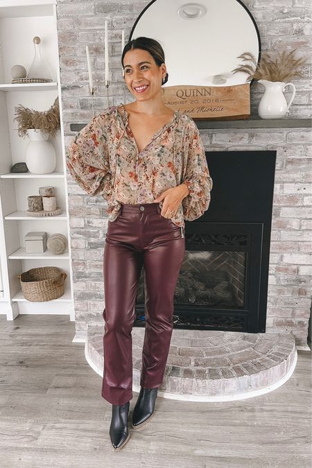 Holiday outfit idea with floral top and burgundy faux leather pants  from buddy love

#LTKHoliday #LTKparties #LTKfindsunder100