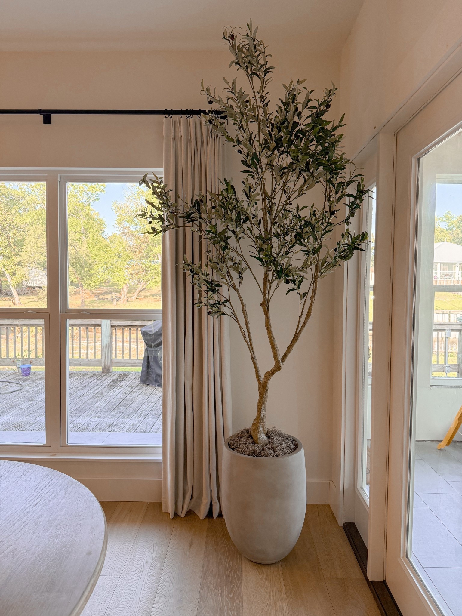 Faux olive tree. Concrete planter  Spanish moss. Curtains. Linen curtains. Curtain rod  

#LTKHome