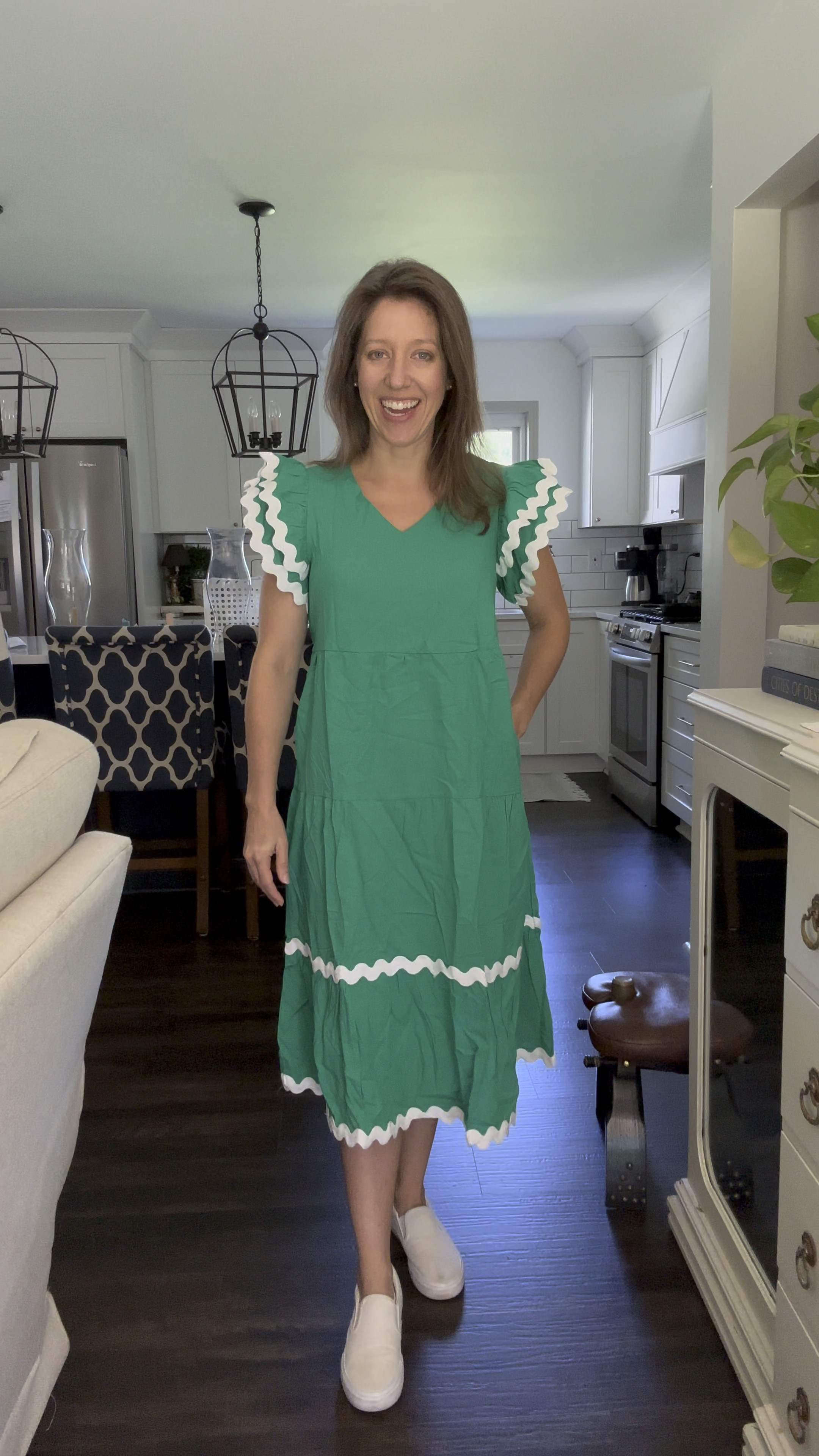 Same Amazon dress but a different color 💚 

Trying green in the fabulous flutter sleeve Rick rack dress 

Wearing S 
Midi length 
Has pockets 
Runs TTS 
Comfort level 10/10 
Lined at the chest
Linen type material 

Comes in pink and black • red too! 

#LTKStyleTip #LTKTravel #LTKWorkwear