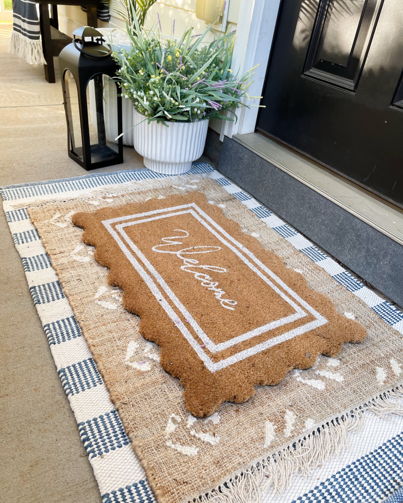 Front porch and back patio views for spring! My favorite scalloped welcome rug is BACK IN STOCK! 

#LTKHome #LTKSaleAlert #LTKSeasonal