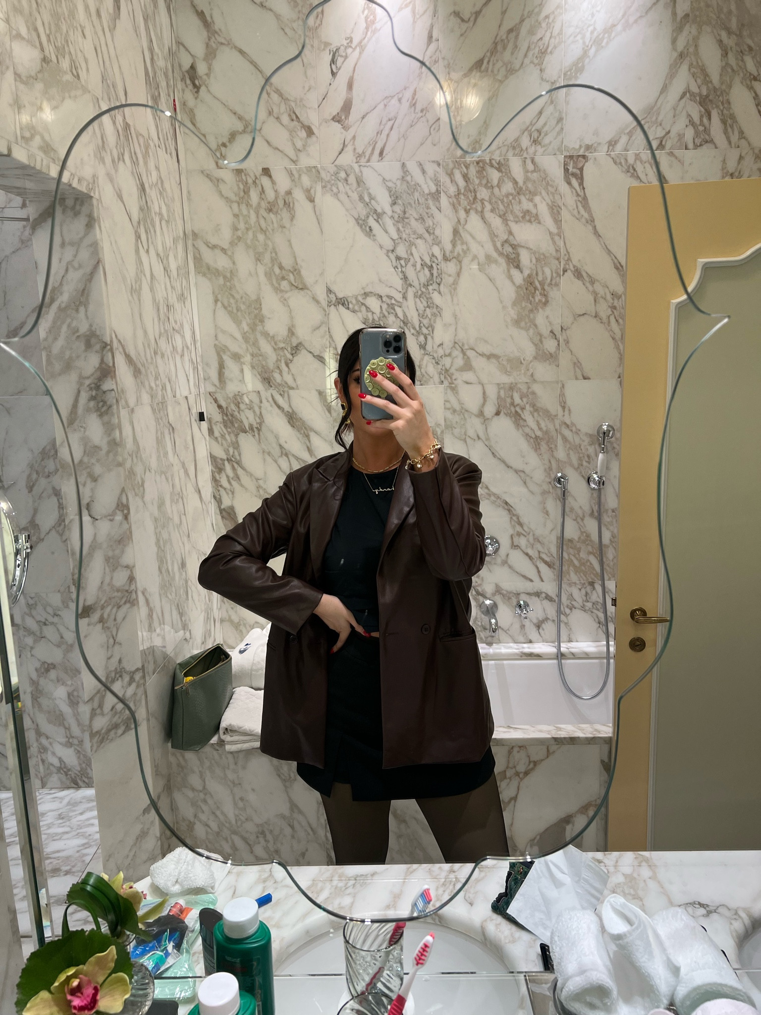 Loved this chic look in Italy!!! Can never go wrong with an all black look but I loved adding this brown leather blazer overtop. I linked my exact one from Windsor but found one from revolve on MAJOR sale 

#LTKstyletip #LTKfindsunder100 #LTKtravel