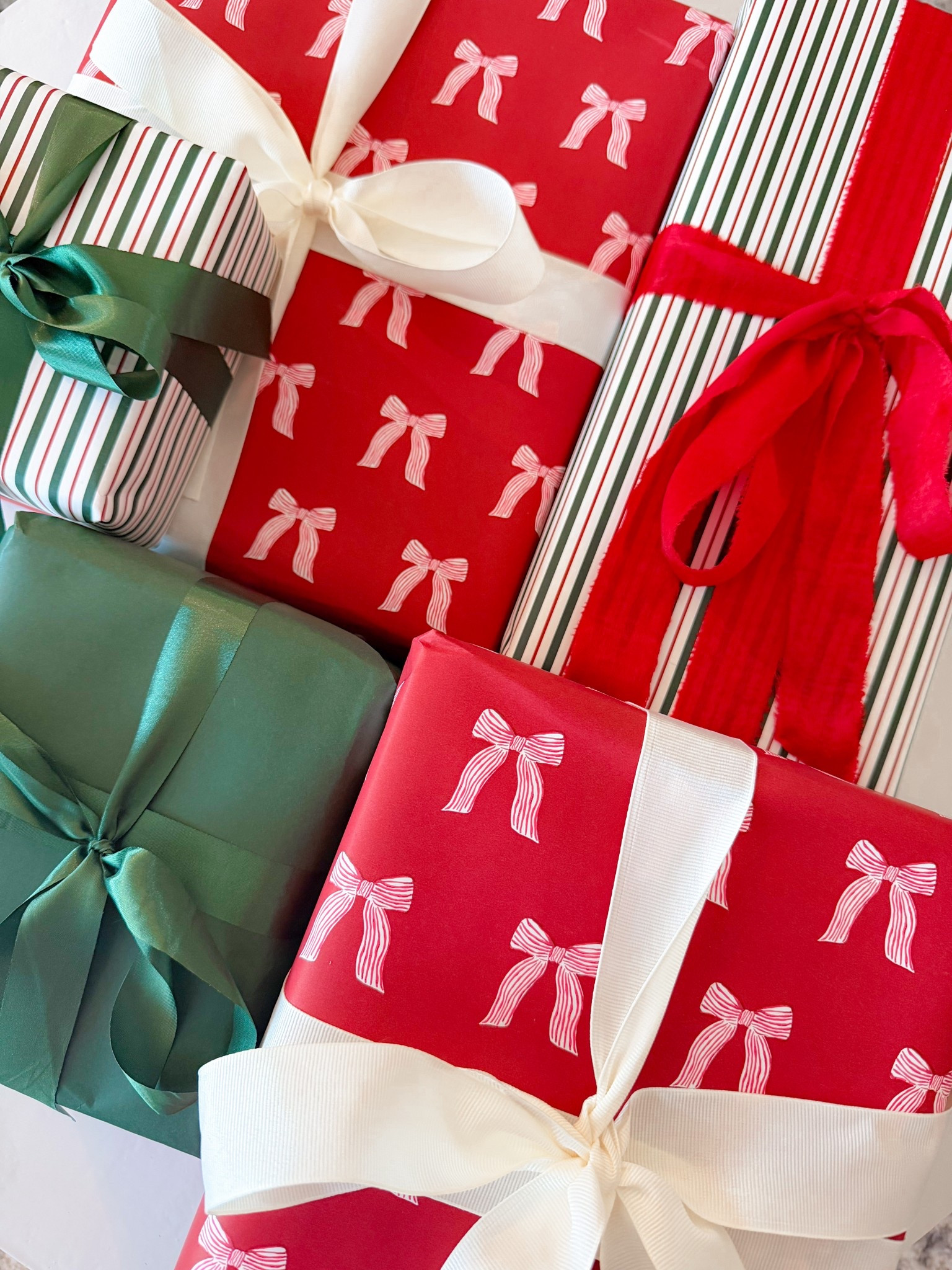 Love, love, loveeeee my Christmas wrapping paper + ribbon combo this year 😍🎁🎅🏽 The wrapping paper is incredible quality & comes with a good bit of paper! 

Christmas wrapping paper / wrapping paper / Christmas gifts / gift wrapping / Christmas 

#LTKSeasonal #LTKHoliday #LTKGiftGuide