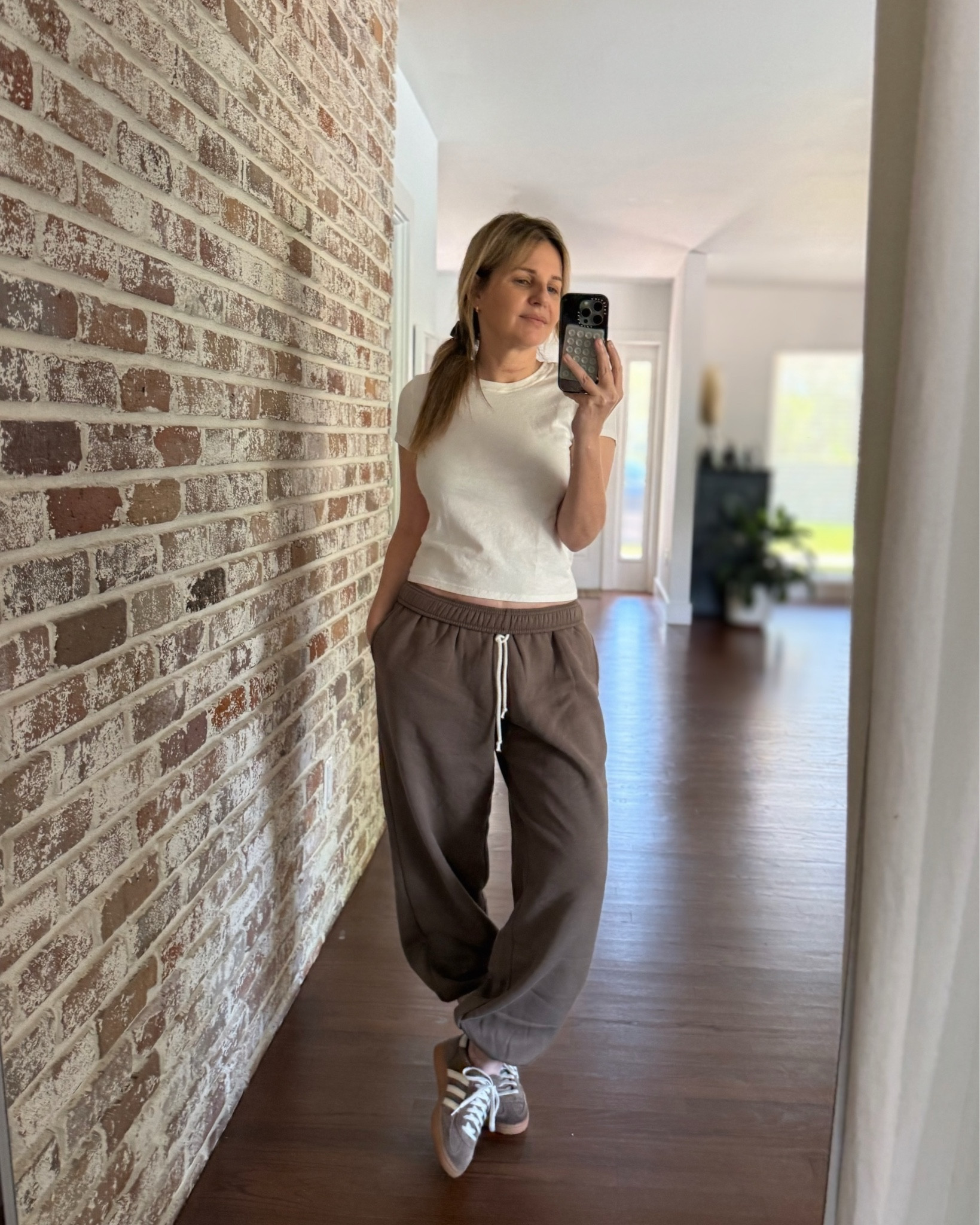 Abt to head out on a Saturday morning, here’s a quick pic of what I’m wearing. Plain white baby tee w a pair of taupe baggy sweatpant joggers from @Target (I sized up from S to M for an even looser fit, but these do run TTS w an oversized fit) They’re  v soft + comfortable plus love the elastic ankles and white drawstring that kinda gives a little bit of retro. *Just ordered these in the blue too bc I like them so much, linked those below as well. Sneakers are my @adidas in brown suede 🤎

#LTKSaleAlert #LTKootd #LTKdayinmylife