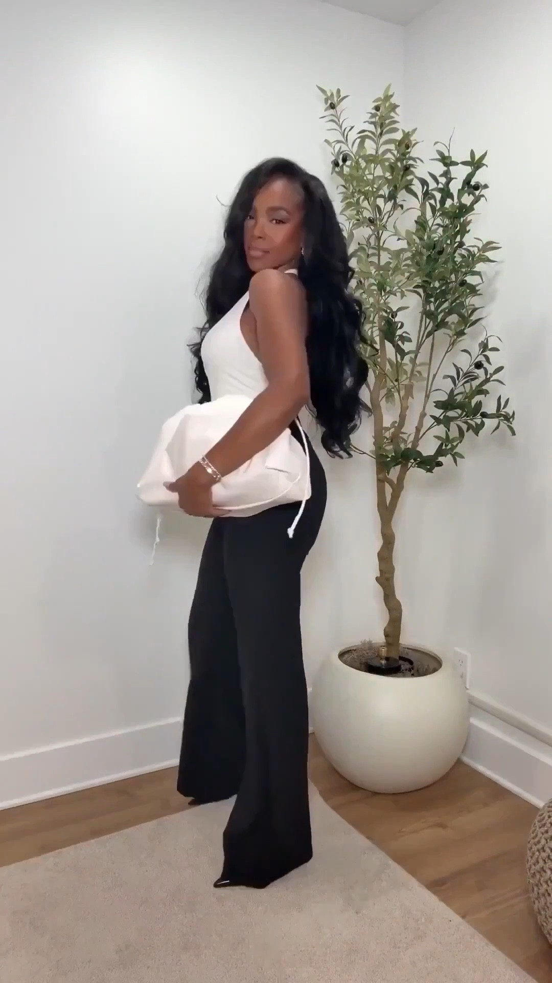 Scroll to shop!! This chic neutral outfit featuring a fitted white halter top styled with high-waisted black flare trousers is perfect for date nights, dinner with friends, or a polished evening outfit that still feels effortless.

#LTKgrwm #LTKootd #LTKPetite

#LTKgrwm #LTKootd #LTKPetite