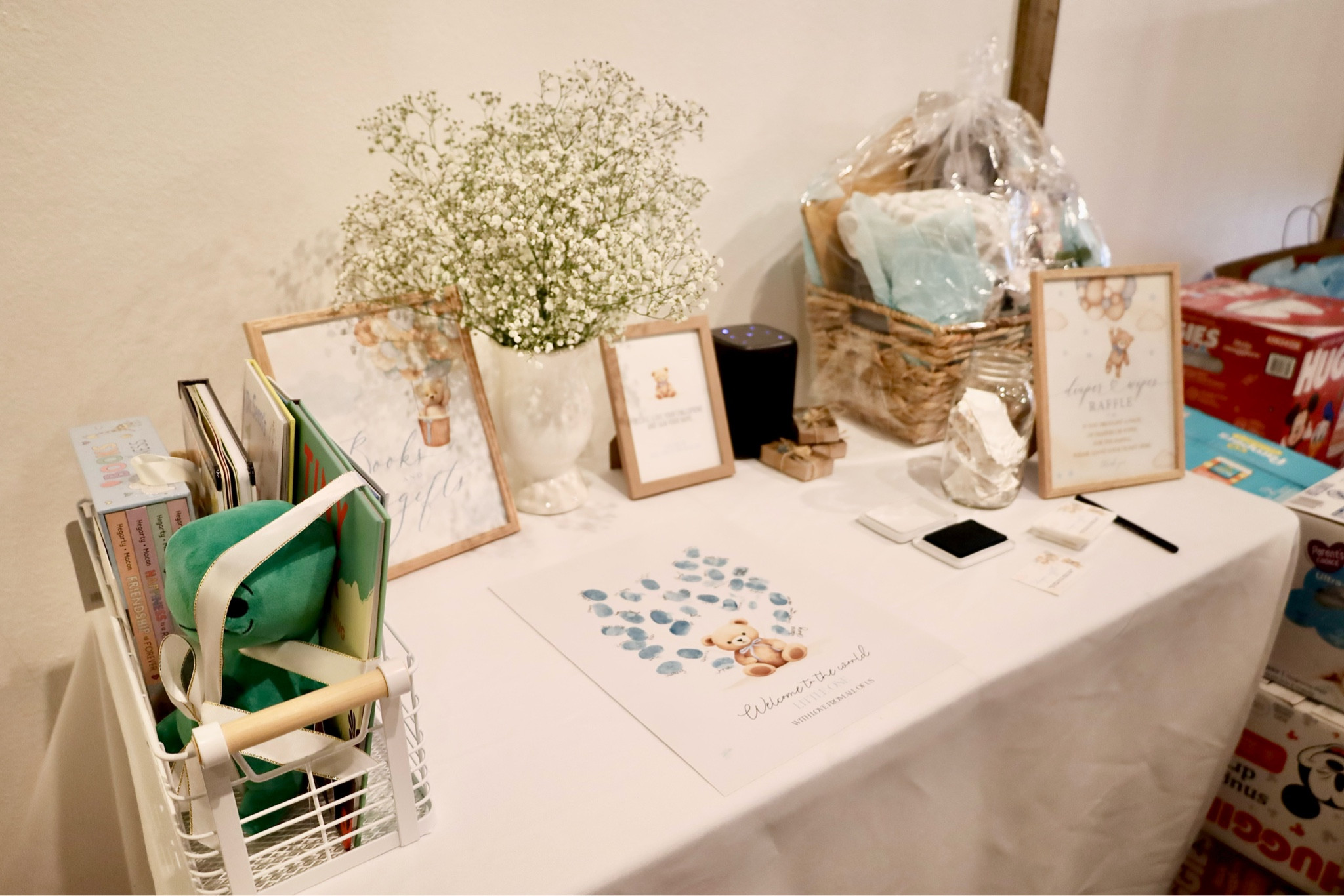 Welcome Table:

•Book Bin: Target
•Thumbprint Guestbook: Etsy
•Blue Ink Pad: Amazon
•Wooden Frames: Amazon
•White Porcelain Vase: Hobby Lobby
•Template Signs: Etsy