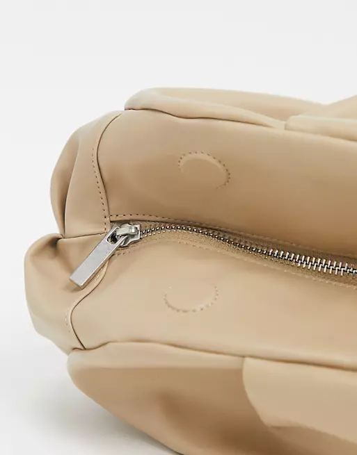 ASOS DESIGN oversized ruched clutch bag in beige | ASOS | ASOS (Global)