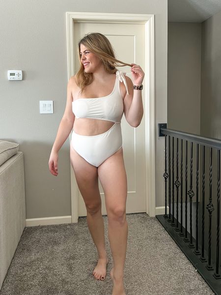 White, one piece swimsuit, one shoulder tie, size extra-large from target. #Vacation #Midsize #Curvy #Competition.

#LTKswim #LTKFind #LTKcurves