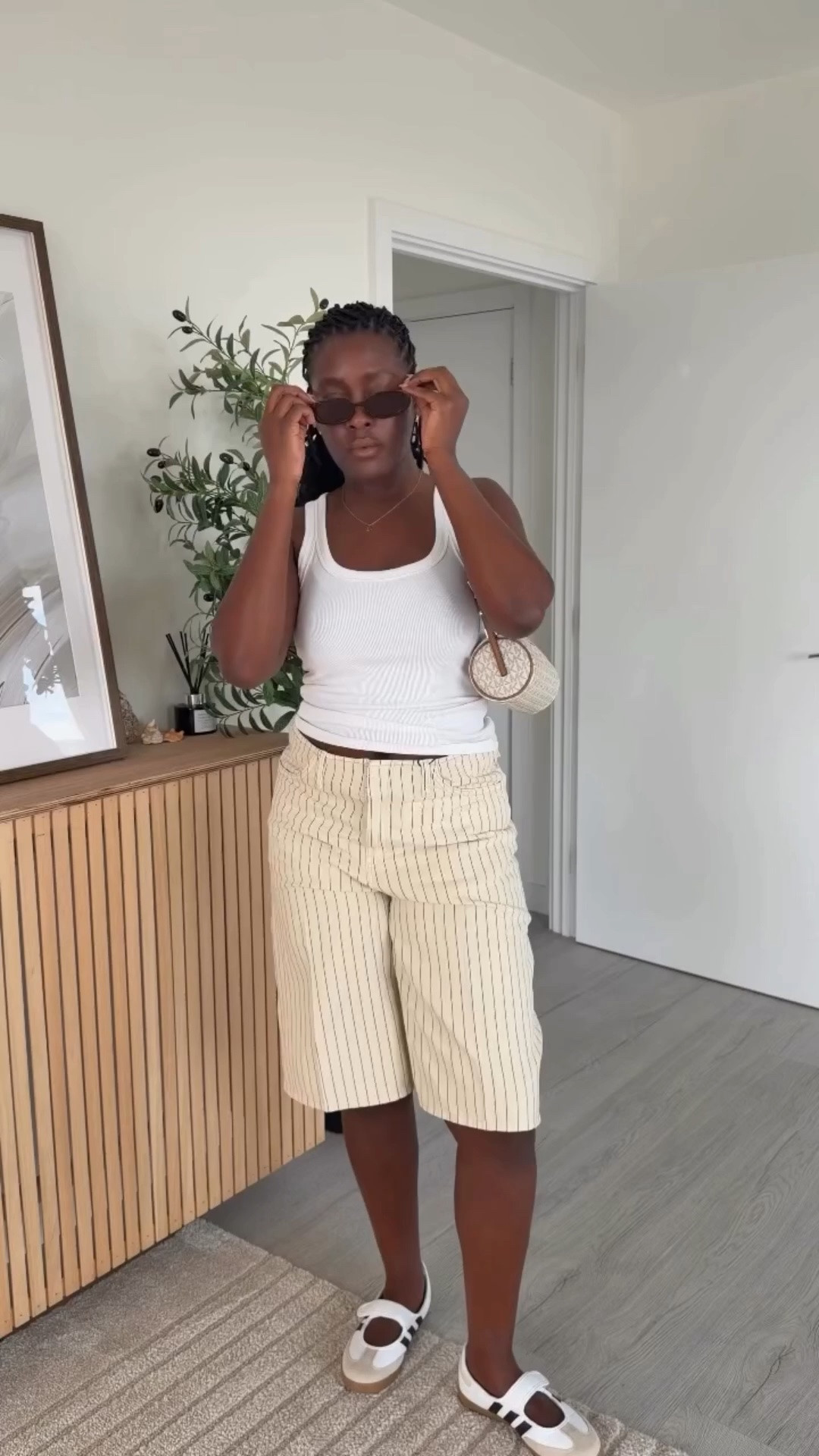 Heat wave ootd? Linen jorts. Linen stripped jorts from @mango @adidasuk @michaelkors #jorts #ootd #summerootd #midsizefashion #minimalstyle jorts on curvy, midsize jorts , linen jorts, how to style jorts