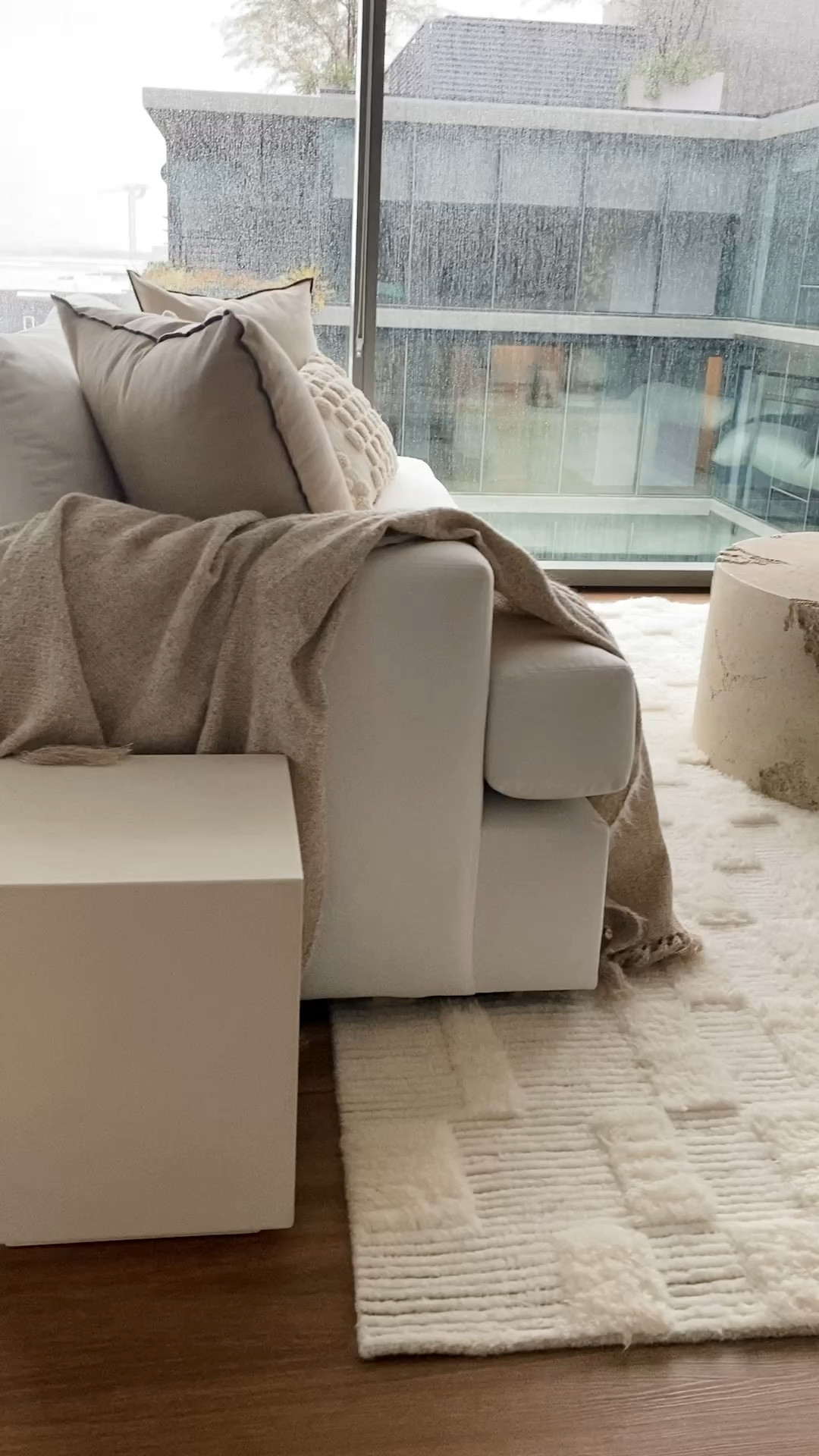 Organic Modern home styling🤍

White couch, sofa sleeper, side table, stone table, wool rug, coffee table books, throw pillows, neutral decor

#LTKHome