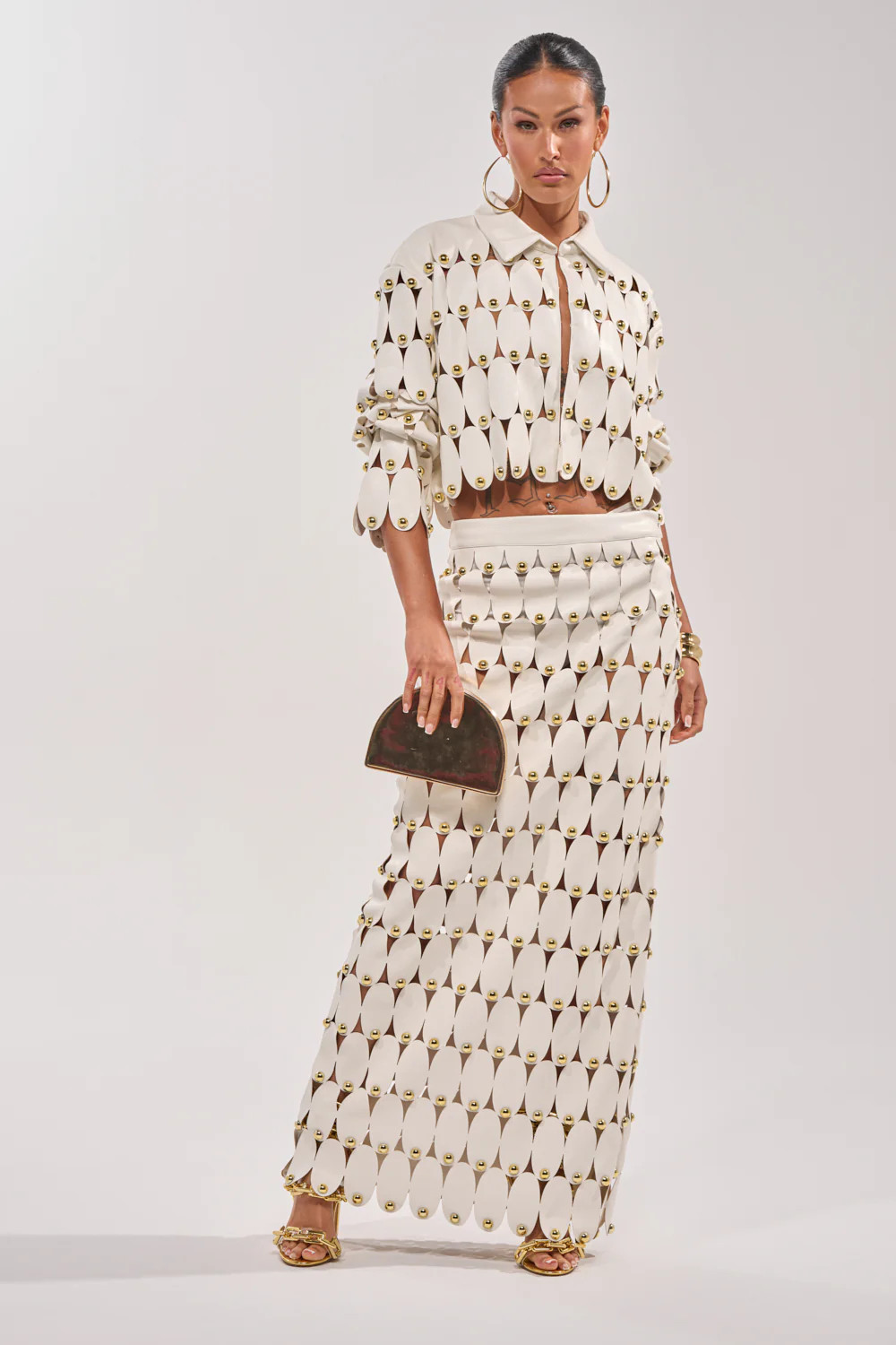 THE SNEAK PEEK STUDDED PU MIDI SKIRT IN WHITE | AKIRA