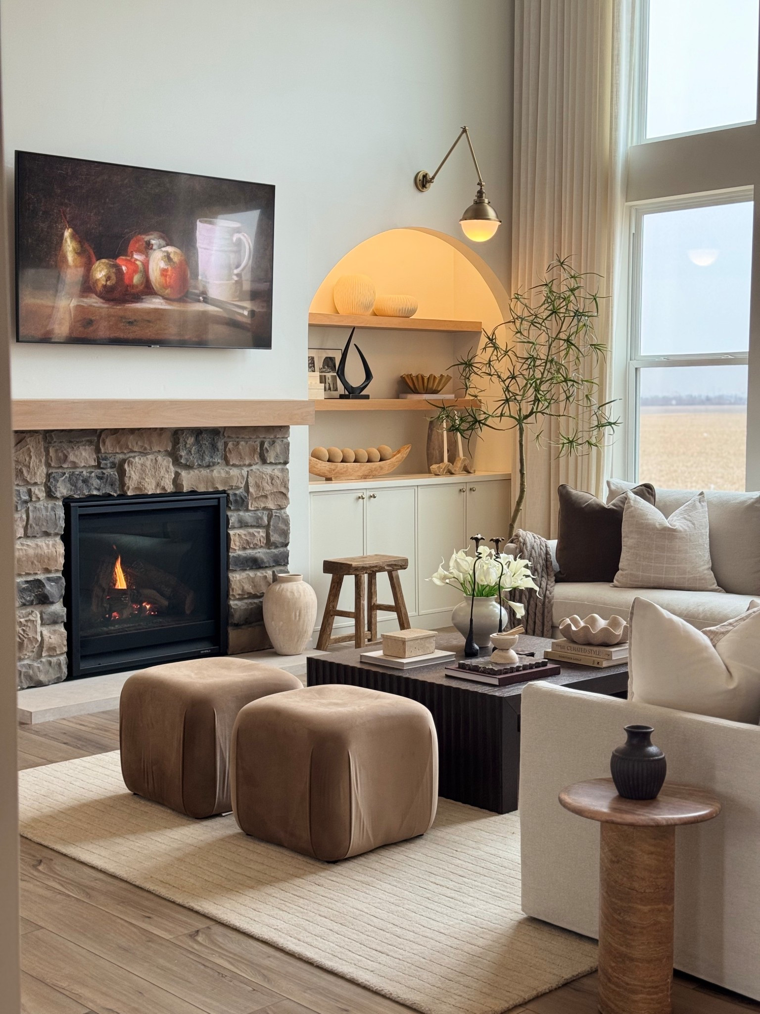 Just one of those gloomy afternoons where the fireplace is on, the lamps are glowing, and the whole house feels extra cozy 🤎

#LTKHome #LTKdayinmylife