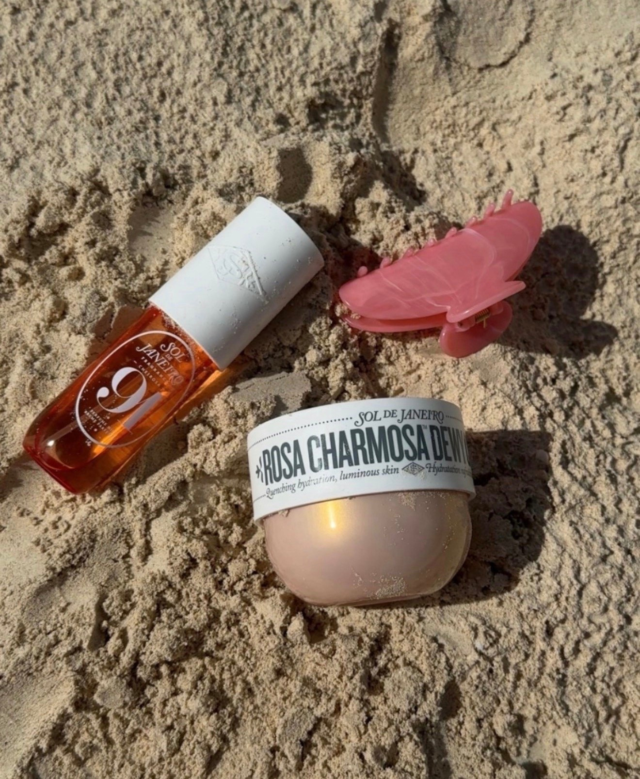 Beach bag essentials lately 🌺✨
The Sol de Janeiro combo + the cutest claw clip = summer in a picture. Smelling good and staying moisturized all season long. #vacation

#LTKSeasonal #LTKTravel #LTKselfcare