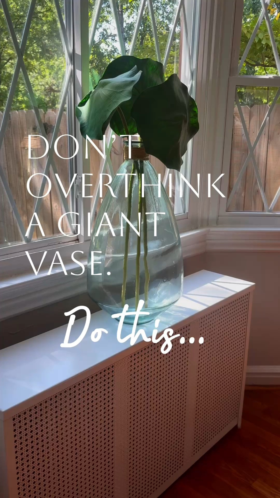 Sometimes the simplest arrangements make the biggest statements. A large demijohn vase and simple green stems add the organic touch you are looking for.

#LTKHome