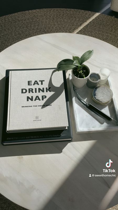Coffee table inspo! Decor for modern living room. EAT DRINK NAP book from Soho Home. #coffeetabledecor #coffeetable #modernliving #modernlivingroom 

#LTKstyletip #LTKxPrime #LTKhome