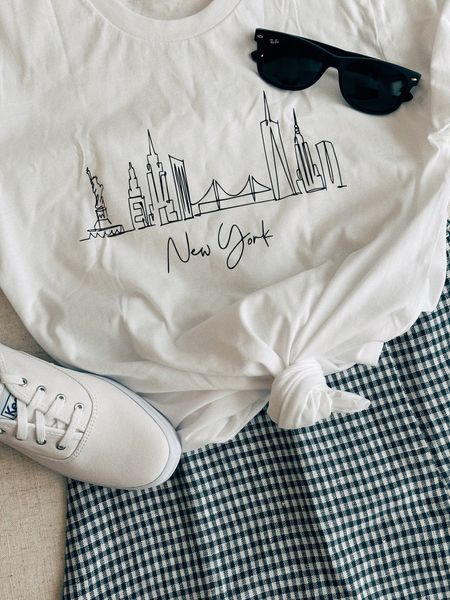 Welcome to New York 🩵😎🌃 I’m planning some really fun “Everyday Eras” 1989 TV outfits that I can’t wait to share with you! I’ll always be a Speak Now girlie but I’m really excited to celebrate this pop album re-record! 

Casual outfits, flatlay, graphic tee 

#LTKFind #LTKstyletip