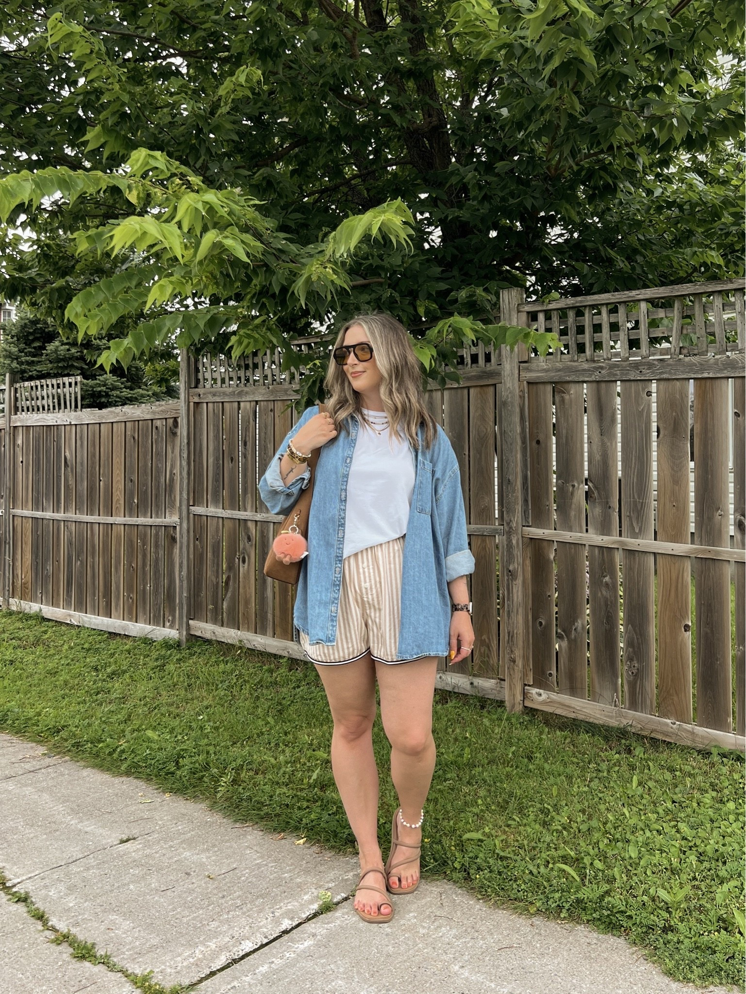 Comfy summer outfit! Wearing my usual size L in the denim shirt and striped shorts. Linked similar white tee. I’m a 9.5-10 shoe and wear a 10 in the Crocs sandals. Canadian Old Navy and Crocs links are under “similar products”

#LTKsummer #LTKsale #LTKmidsize