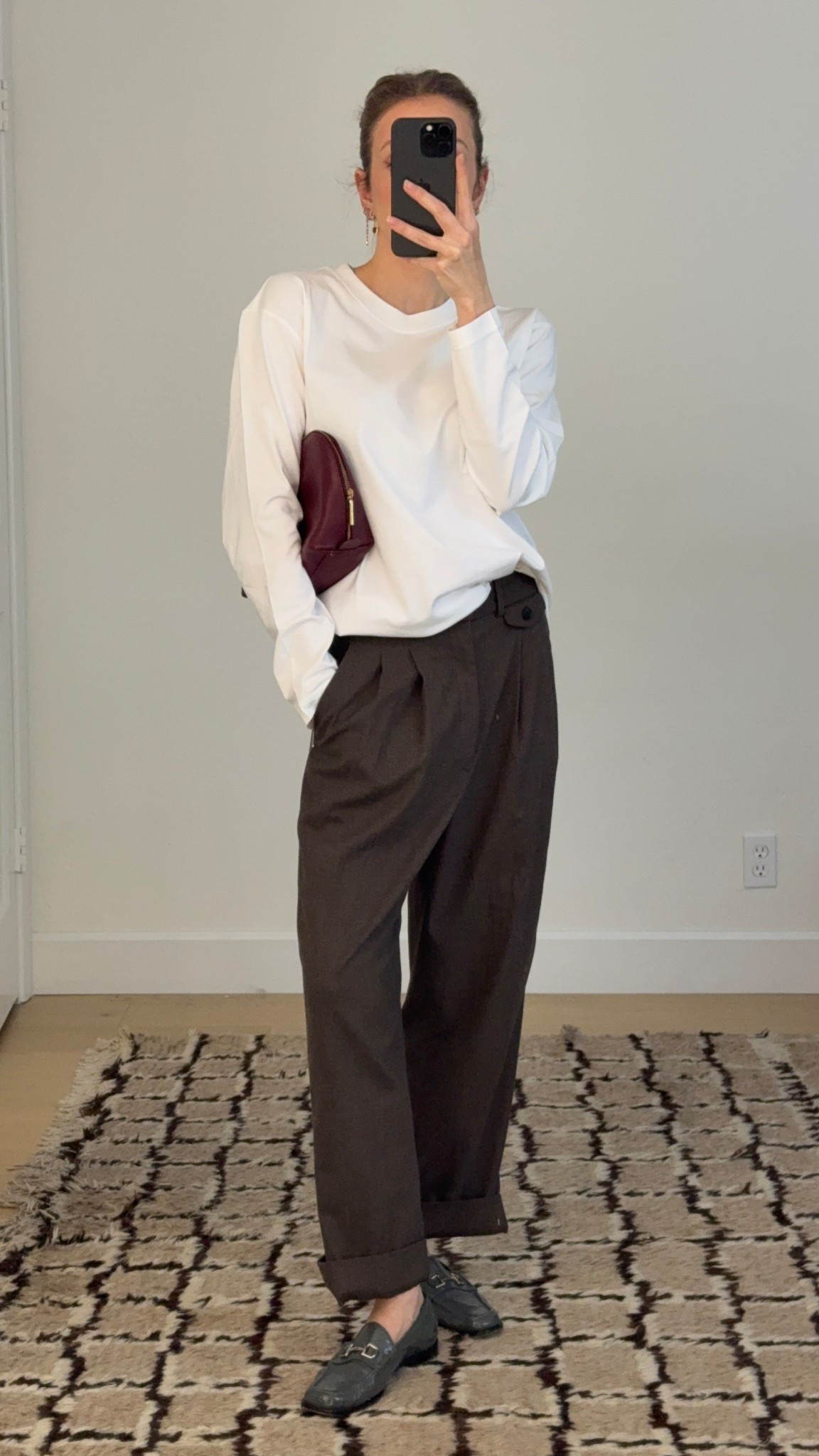 Day 2 just wear it January
Organic basics top, similar to the Renggli long sleeve. 
Super old Zara pants I thrifted in college. 
Vintage Gucci loafers, the most comfy loafers I own. 
Cuyana travel case I use as a clutch  

#LTKootd #LTKWorkwear #LTKFindsUnder100