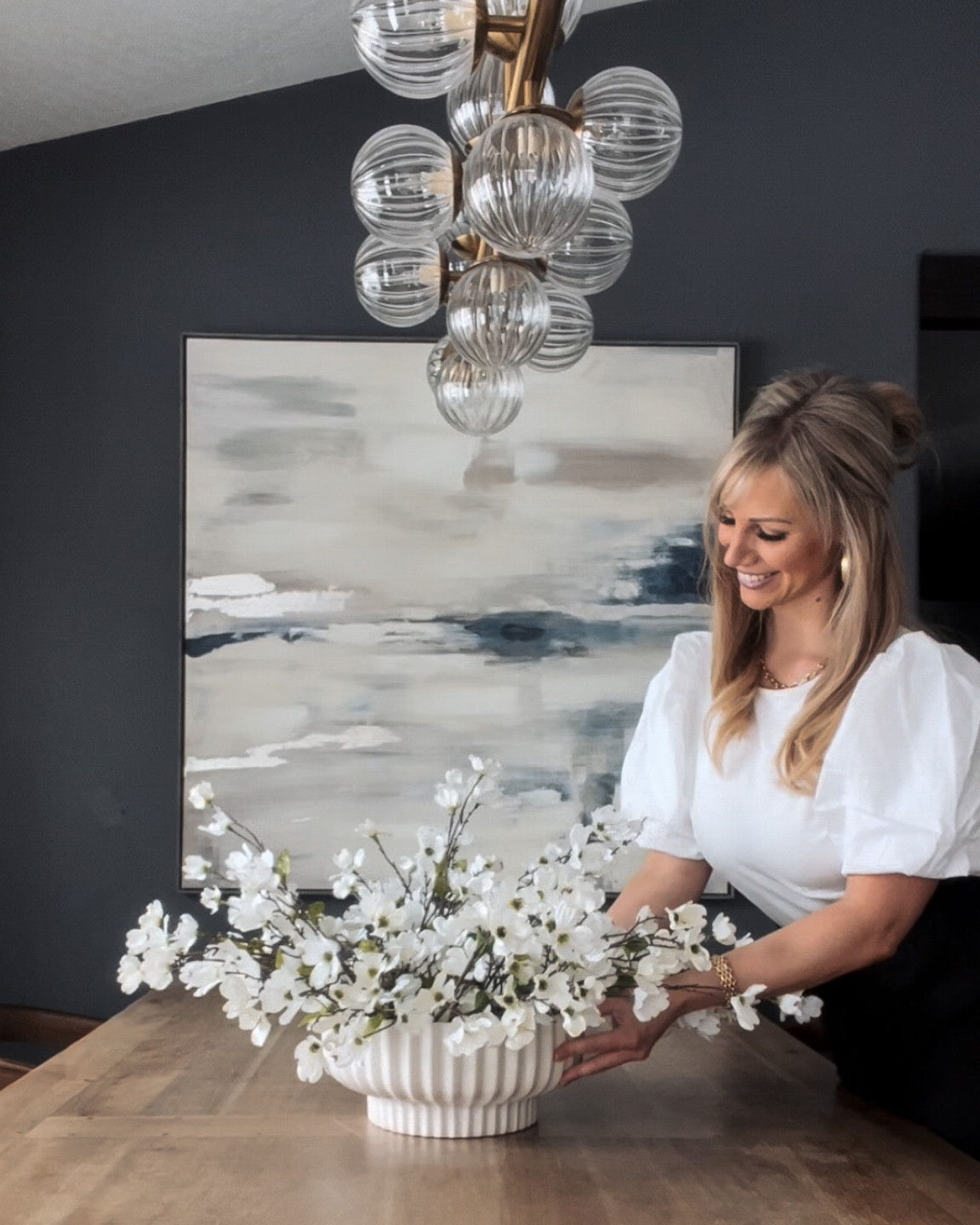 Vase, faux flowers, puff sleeve top, chandelier  and dining chairs linked. Linking similar artwork and table.


#LTKSeasonal #LTKhome #LTKFind