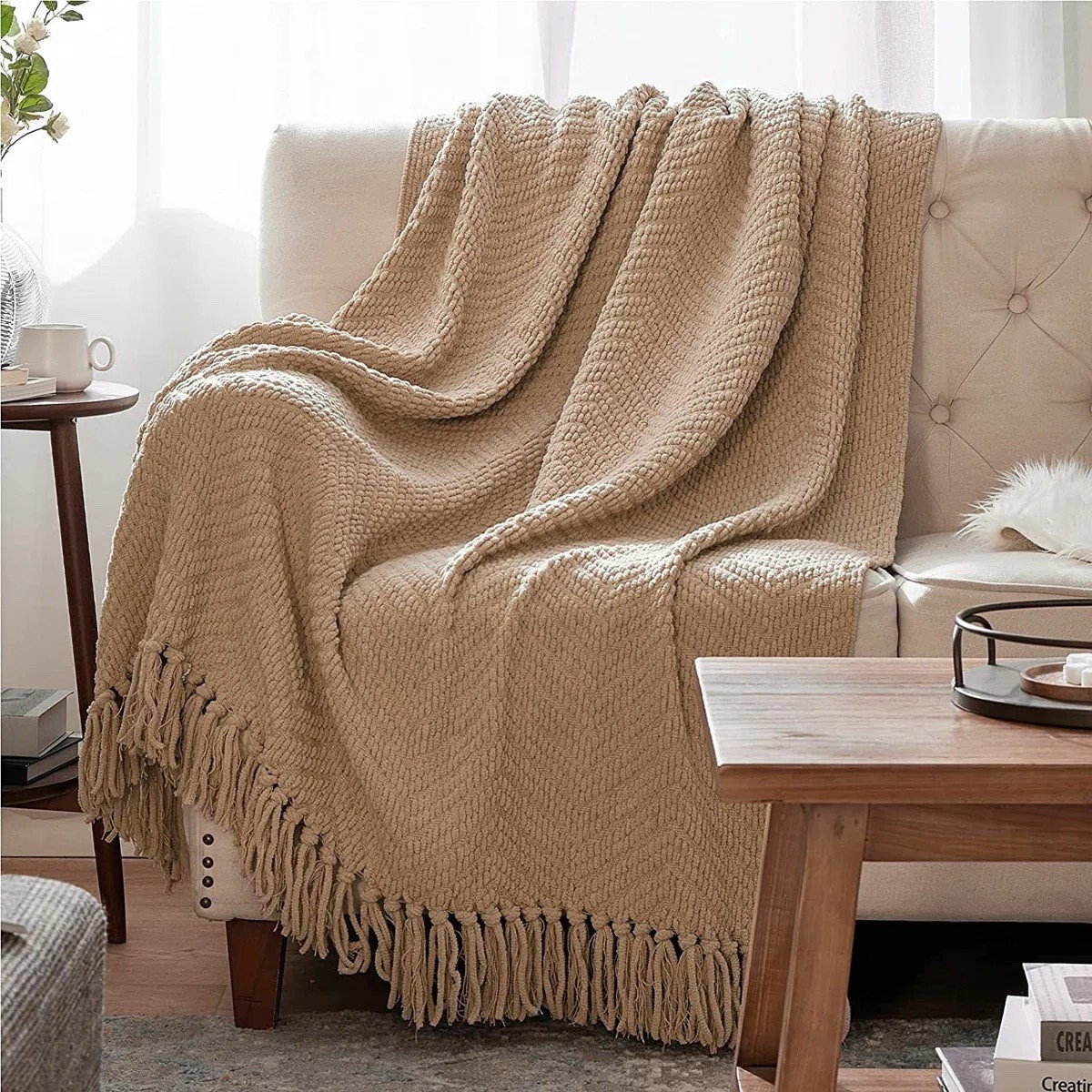 Drape this knit throw over your sofa or bed for an instantly cozy, styled look that feels warm and inviting. ON SALE and under $30. Pair this with a cozy storage bench or chair to complete the look.

Keywords: Throw blanket, chenille throw blanket, storage bench blanket, faux fur throw, upholstered storage bench, cozy storage bench, velvet storage bench, flip top storage bench, wicker storage bench

#LTKHome #LTKSeasonal #LTKSaleAlert