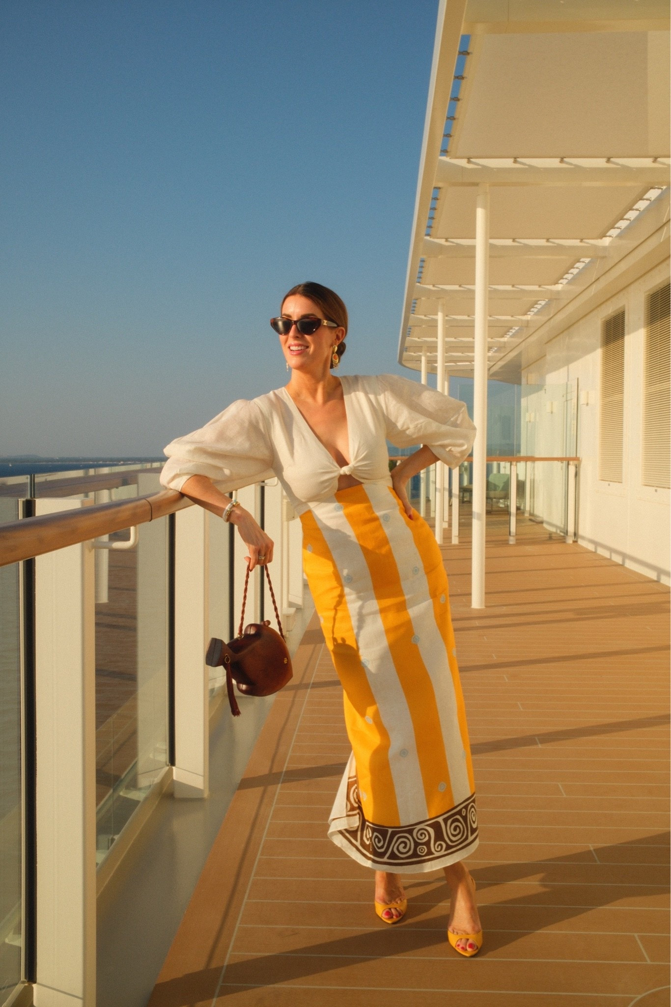Wearing one of my favorite additions to my summer wardrobe 💛 This bright yellow Cala de la Cruz number was absolutely perfect for a Mediterranean night.
I've also gotten so much wear out of these shoes, and I found them back in stock in a few places—if you see your size, don't wait! I've linked them along with a few similar bags to complete the look!

#LTKTall #LTKootd #LTKTravel