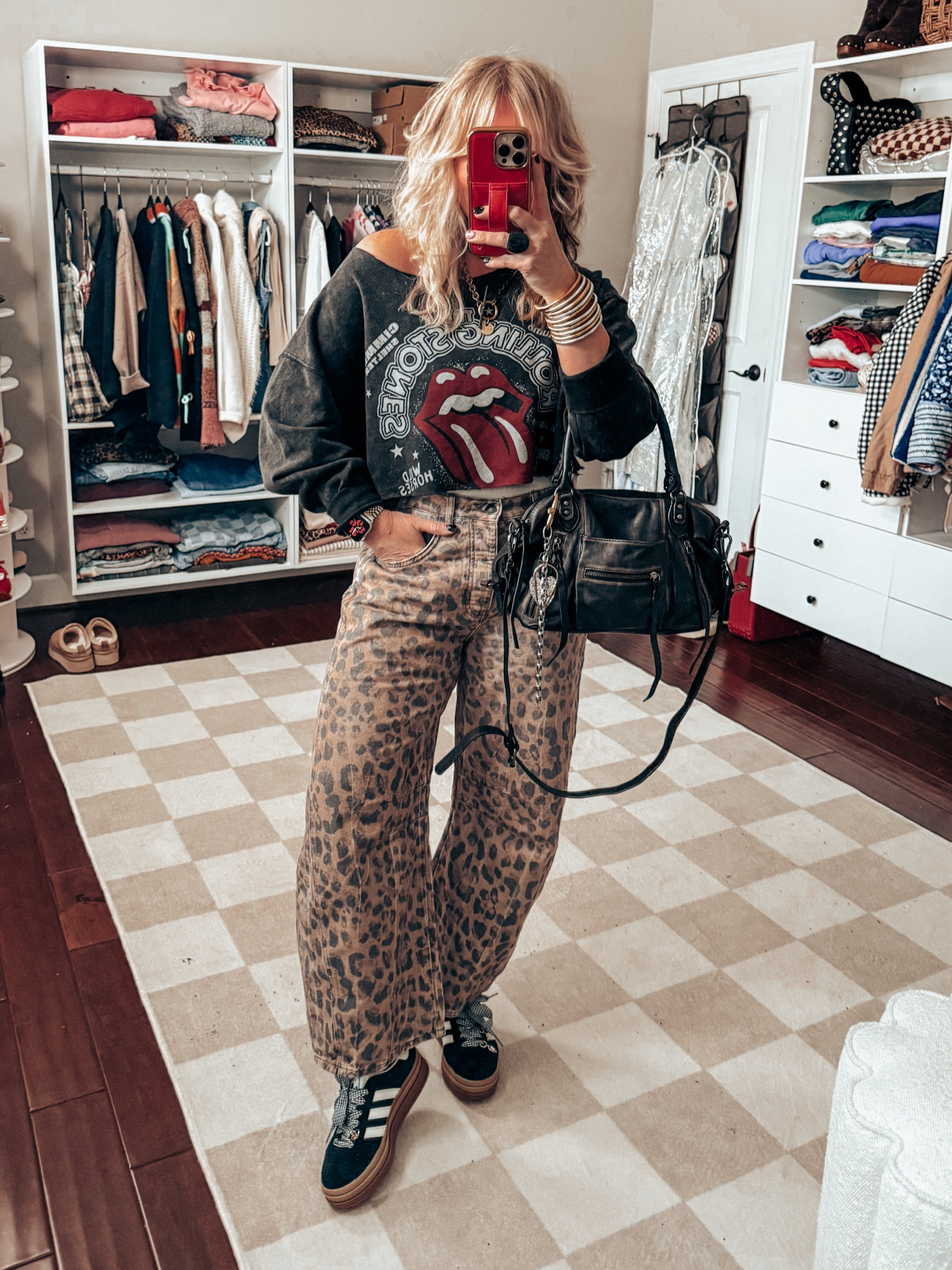These AMAZING FP leopard print jeans are back in stock! They will sell out again! 
•Jeans - I do my true size in these 
•Sweatshirt - sold out size XL (linked the same kind just different graphic). 
•Tank underneath - Medium/Large 
•Adidas - sized down 
✨MY JEWELRY necklace & earrings save with code MANDIE20 


#LTKStyleTip #LTKOver40 #LTKMostLoved