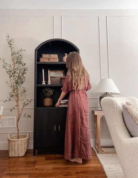 I love this black arched cabinet so much and I finally got the styling just how I like it! Living room decor, living room styling 

#LTKFind #LTKhome