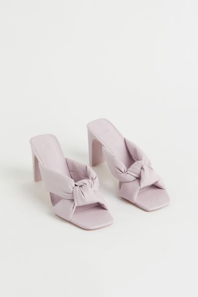 Mules in faux leather. Square toes, wide foot strap with decorative knot at front, and covered bl... | H&M (US + CA)