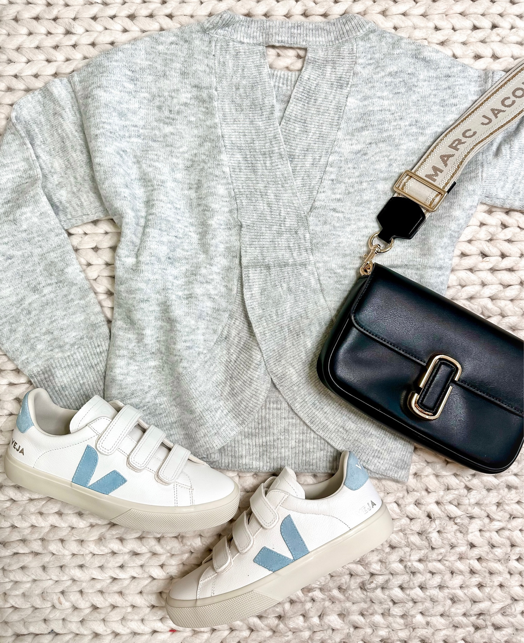 Sweater 
Gray sweater 
Open back Sweater 
Black bag
Sneaker 
Sneakers 
Veja sneakers 
Fall outfit 
#ltkunder100

#LTKshoecrush #LTKitbag #LTKSeasonal