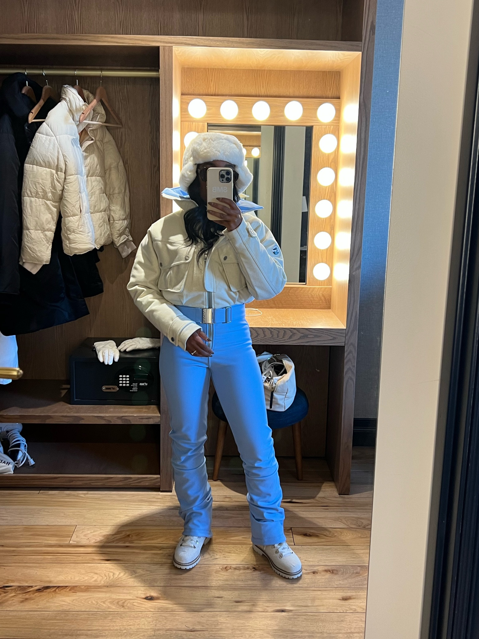 Ski jumpsuit, faux fur hat, boots 

#LTKtravel #LTKshoecrush #LTKstyletip