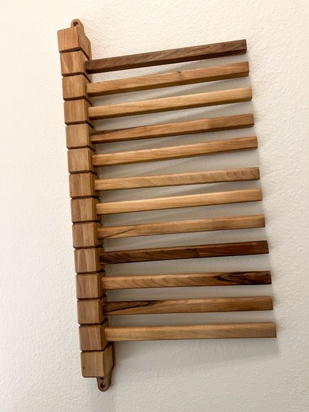 Laundry Room ✨FAVORITE ✨

This walnut wood drying-rack is used EVERYDAY! It’s a perfect place to hang hangers when I’m folding laundry or to air-dry!! 
#laundryroom #wood #etsyfind #styleinspo #style #function 


#LTKbeauty #LTKfamily #LTKhome