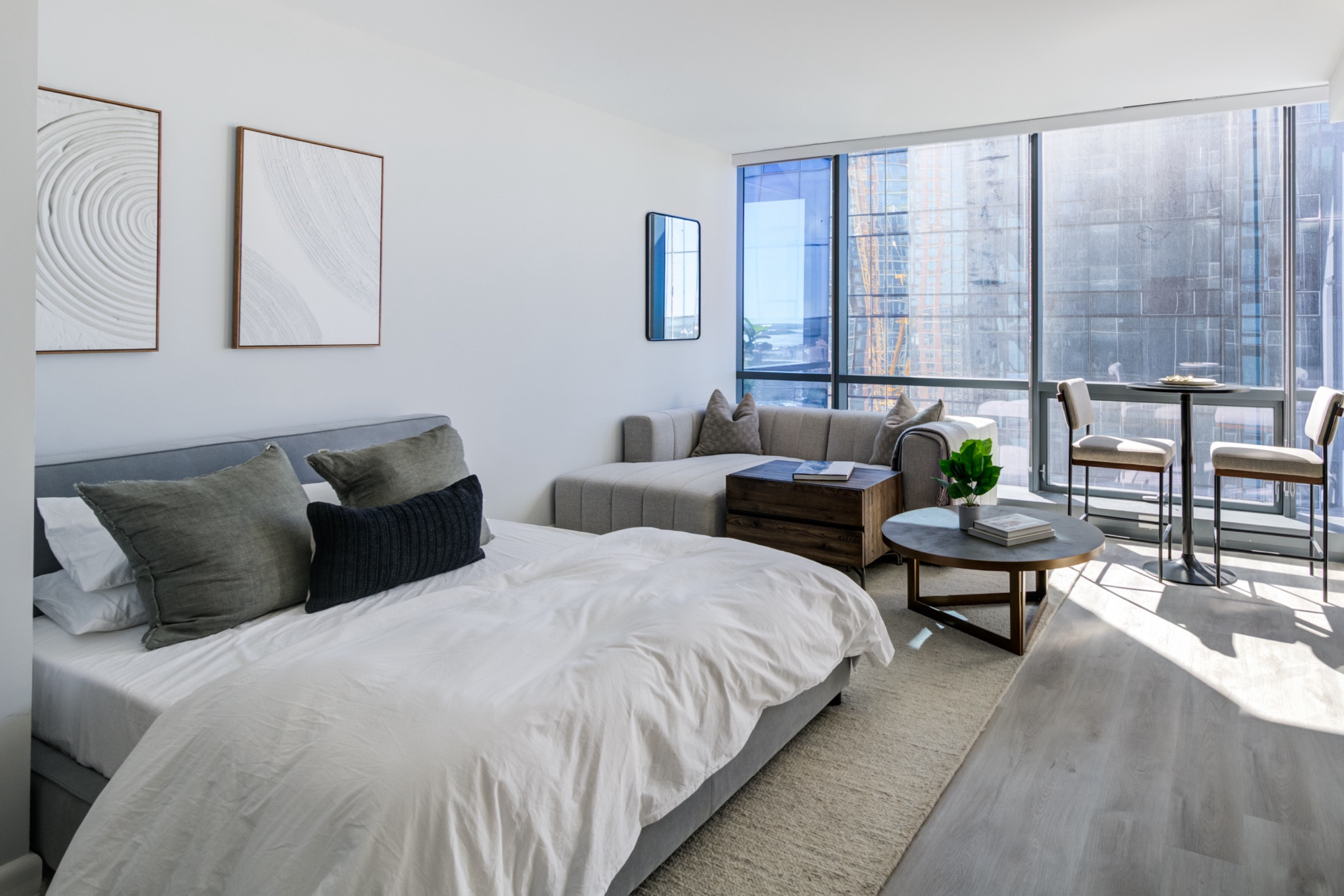 How to make a 500 sq foot apartment feel spacious….its all about neutrals.  