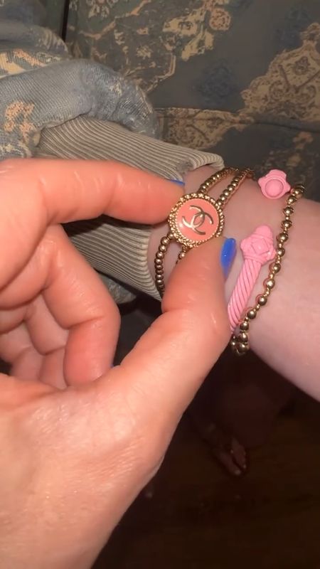 David Yurman Matte pink bracelet.  Chanel button bracelet is from LLF Studio.  

#LTKover40 #LTKstyletip