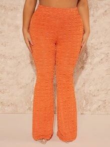 SHEIN SXY Plus Solid Textured Flare Leg Pants SKU: sf2212021587796575(91 Reviews)$17.99$17.09Join... | SHEIN