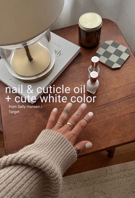 ad I the @sally_hansen color therapy nail and cuticle oil that I got from @target saved my nails this winter i'm tellin u! & how cute is the white color from sally hansen as well?! i'm in love! 

USING:
Sally Hansen Color Therapy Nail and Cuticle Oil 005
Sally Hansen Color Therapy Color 110 "Well, Well, Well” 

#Target TargetPartner #TargetStyle #sallyhansen

#LTKMostLoved #LTKfindsunder50 #LTKbeauty