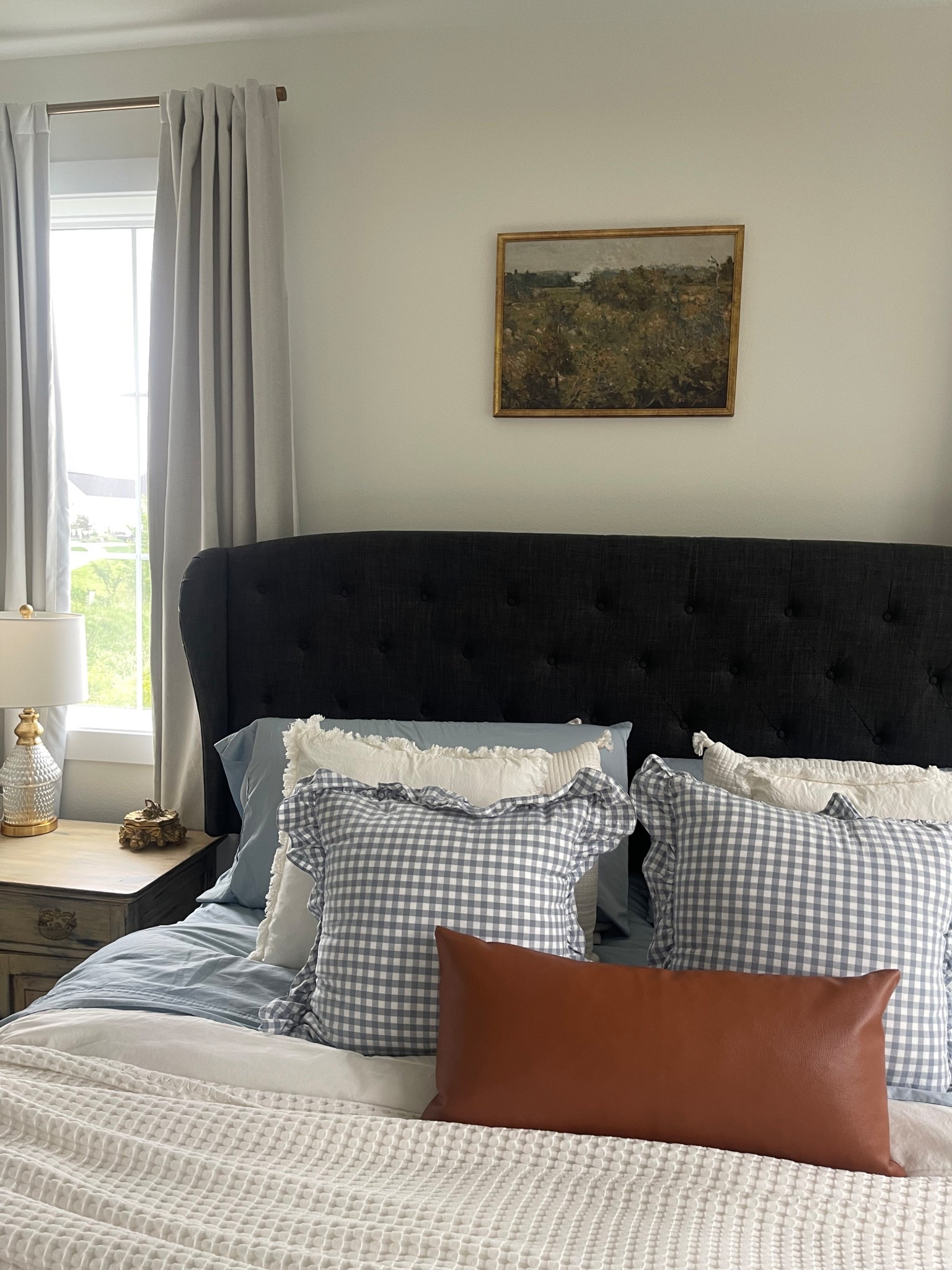 Cornflower blue bedroom decor! Bedroom wall art. Gold curtain rod and sour cream curtains. 

#LTKSeasonal #LTKHome #LTKSummerEdit