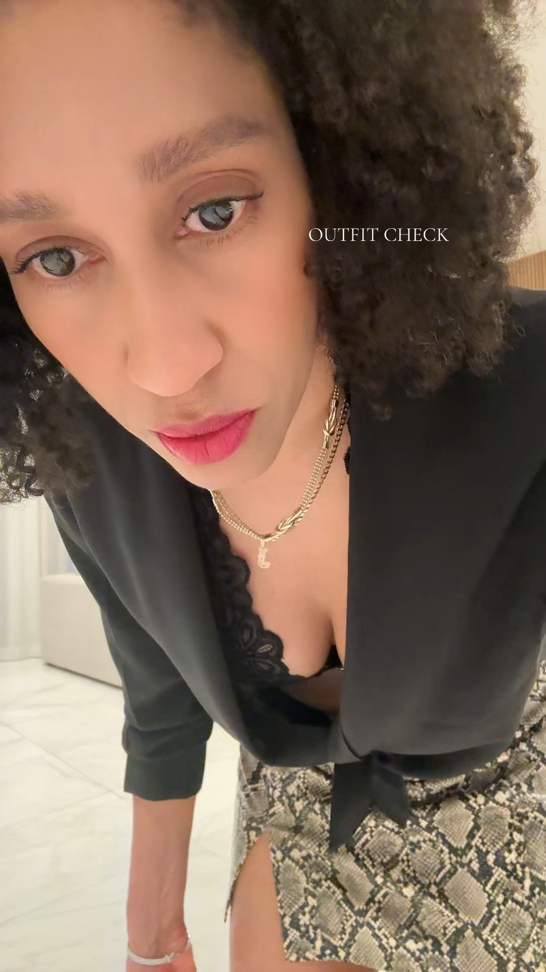 Outfit idea, eearing a mini skirt, bralette, Hermes sandals, black shirt, YSL bag and red lips. Oitd

#LTKootd #LTKTall #LTKOver40