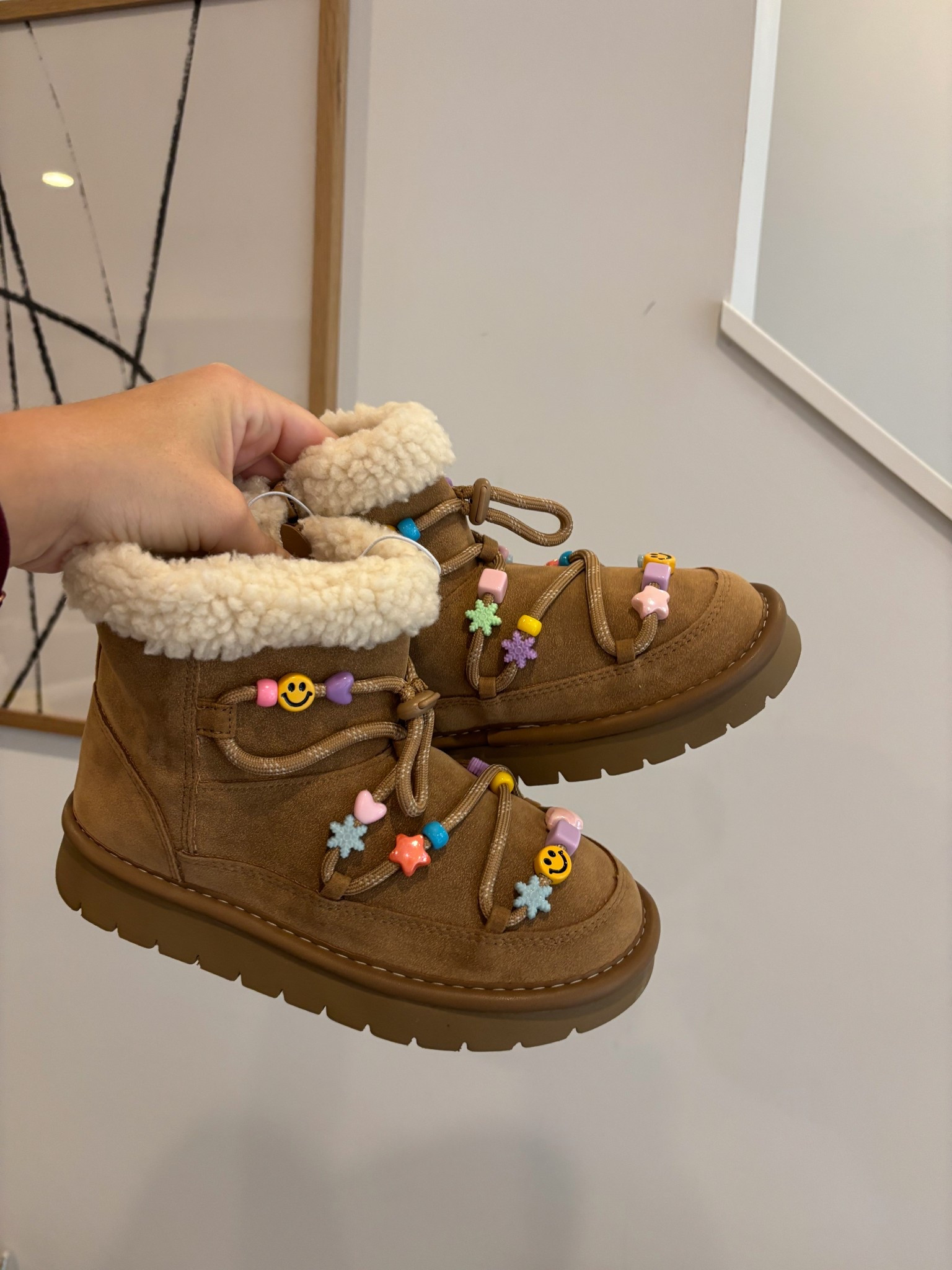 Kids’ UGG dupe alert! 🤎

These art class Char Faux Suede Style Boots from Target are giving total mini UGG vibes — but honestly, they might be cuter. The tan faux-suede finish, soft faux-shearling lining, friendship bracelet details, and chunky sole make them look designer while staying super comfy and easy for kids to wear.

They’re under $40 and have that cozy, neutral look that pairs perfectly with leggings, jeans, or sweater dresses. The side zipper makes them easy for little ones to slip on and off, and the quality feels way more expensive than the price.

If you’ve been eyeing the kids’ UGGs but want a more affordable (and stylish) option, these are such a good find. Linked both here so you can see the side-by-side comparison!

#LTKKids #LTKShoeCrush #LTKFamily