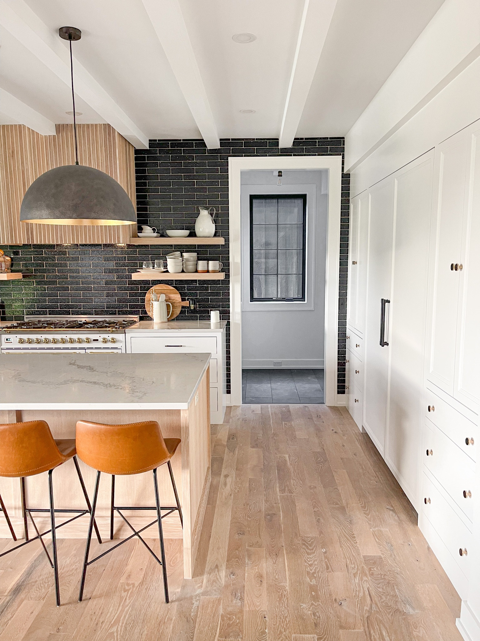 Kitchen, kitchen island, counter stools, island lighting, quartz countertops, white oak, tile backsplash, open shelving, gas range 

#LTKhome
