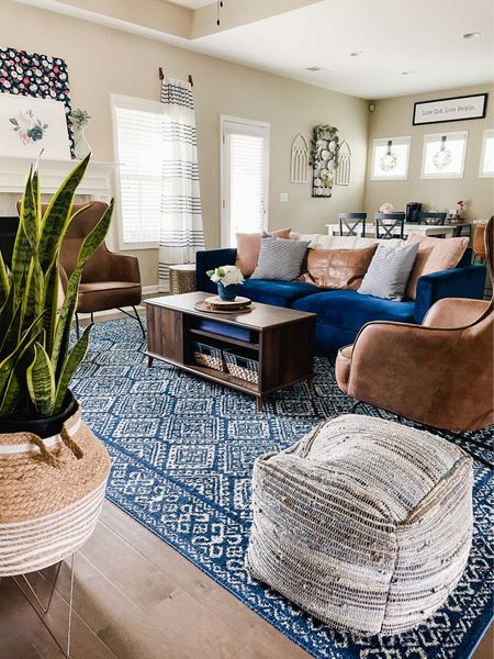 Cozy navy blue family room. Navy blue couch and brown “leather” chairs. Budget living room decor

#LTKkids #LTKhome #LTKfamily