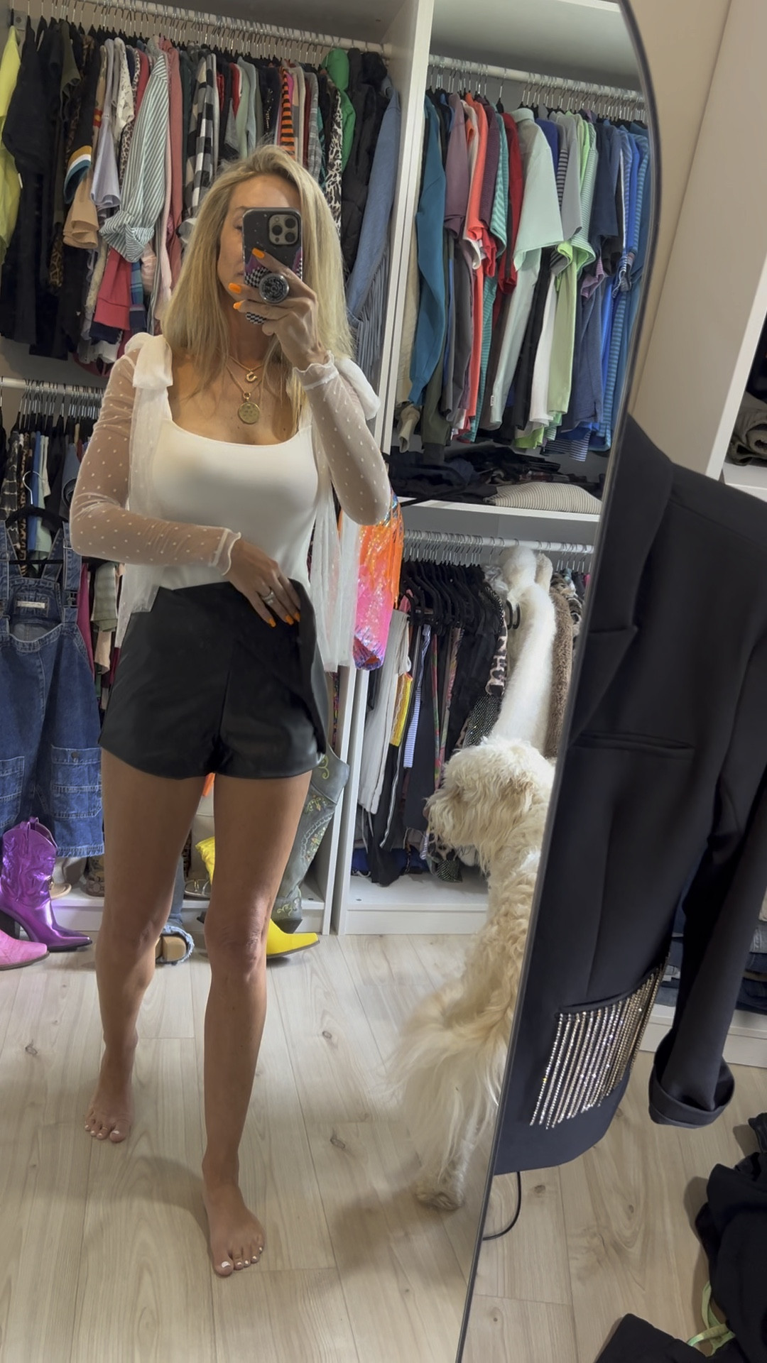 I have this bodysuit in a green color, thought white was cute for spring. Lace detail. Wearing XS. The faux leather skort is XS

#LTKFestival #LTKstyletip #LTKfindsunder50