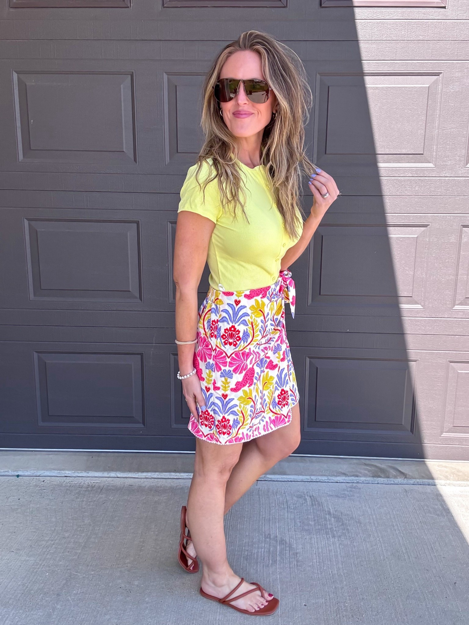 This bright and colorful look is so much fun! 💛 Loving the yellow button down top paired with the multicolored skort. Wearing an xsmall in the top and small in the bottom.

As an Amazon Influencer I earn commission on qualifying purchases.

Yellow top, short sleeved top, spring fashion, multicolored skort, spring style 2026, mom style, wear to work attire, summer fashion 

#LTKootd #LTKMidsize #LTKWorkwear