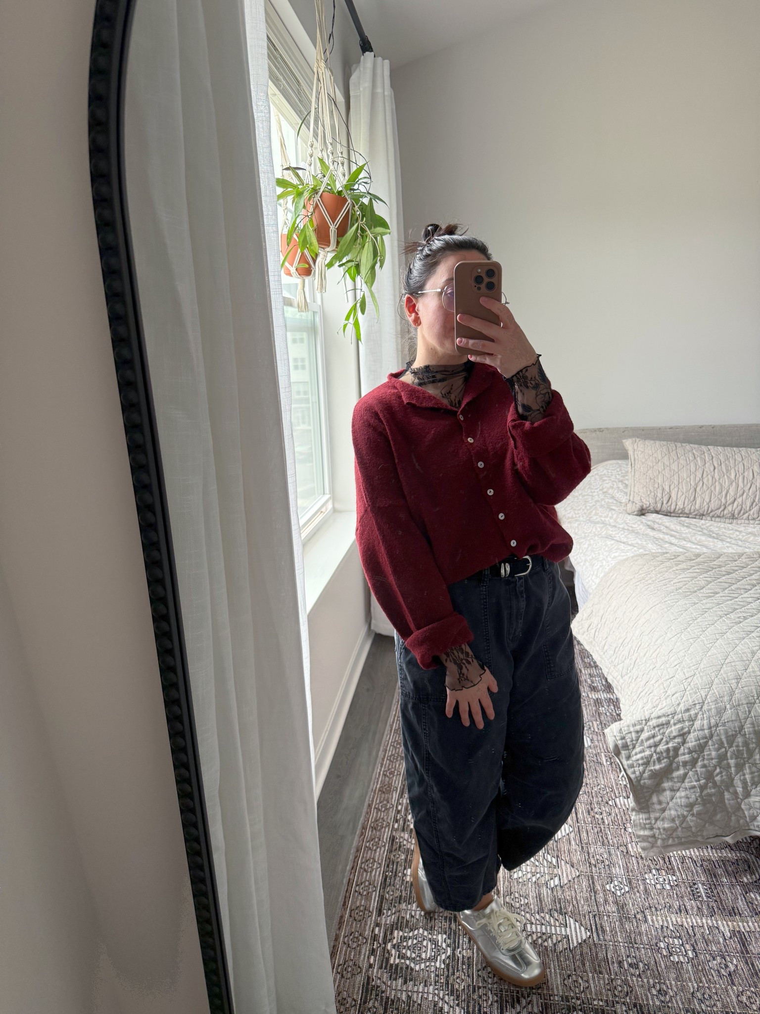 Planning some work outfits for my new job! Going for a goth yet business casual vibe 🧛🏻‍♀️

Black barrel pants are oversized size 12 petite - exact directly linked! I have them in 3 colors 
Silver sneakers are size 8 bought on Poshmark but exact are linked here

Black suede belt with silver metal details is size M and exact is linked here as well as some other similar ones 

Roll-neck cardigan sweater is Things Between size small - exact linked here

Black sheer lace black high neck layering shirt is unknown brand bought on Depop size M - similar linked here