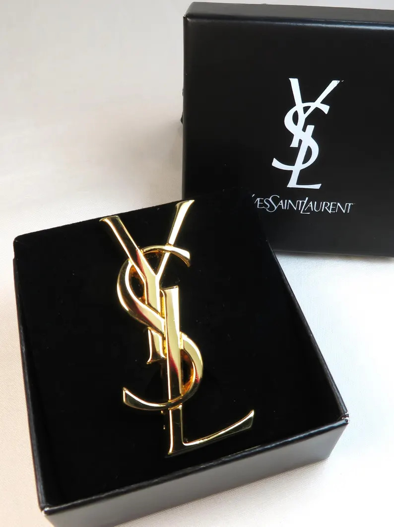 Original and vintage YSL brooch in fine gold-plated metal, 1980s | Etsy (Global)