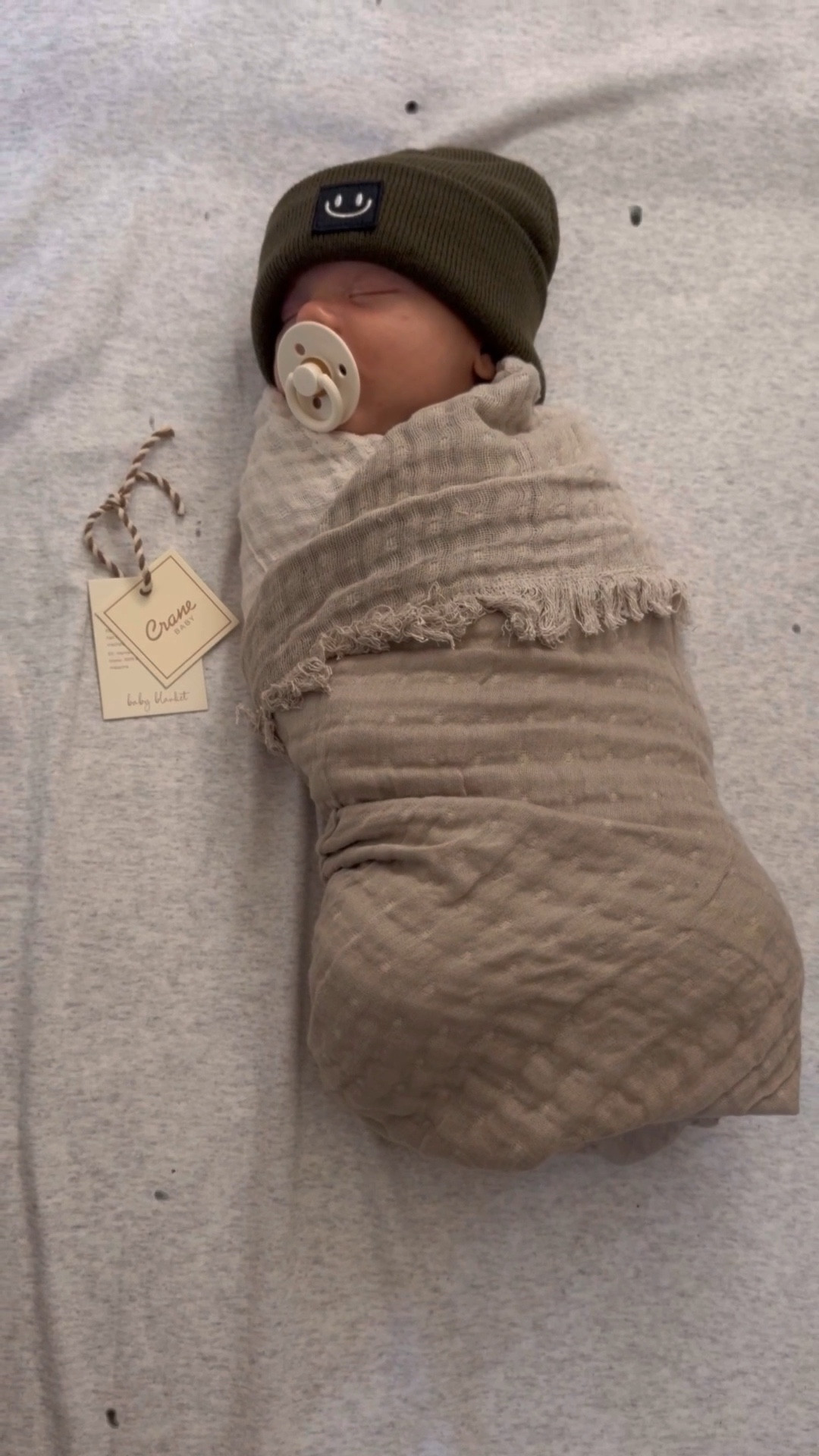 Wrap your little one in luxury with the Crane Baby Muslin Swaddle Blanket. Featuring subtle ombre tones in white sand, this blanket adds a touch of modern elegance to your baby essentials. Versatile and chic, it’s perfect as a stroller blanket, nursing cover, or swaddle wrap. Elevate your nursery with this must-have accessory! 🌟✨ #cranebaby #cranebabypartner #cranebabyombre

#LTKBaby #LTKKids #LTKBump