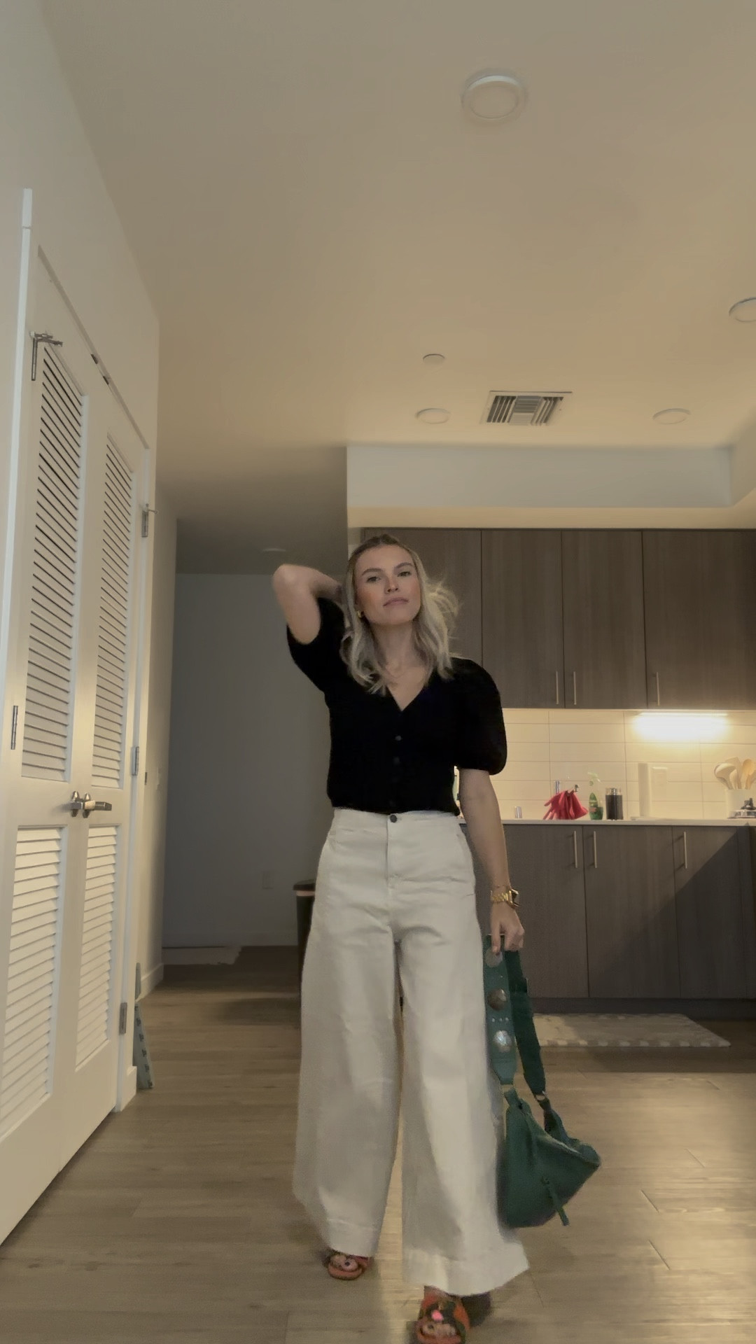 Wide legged pant with a balloon sleeve top and sandals, paired with free people cross body  

#LTKStyleTip #LTKShoeCrush #LTKItBag