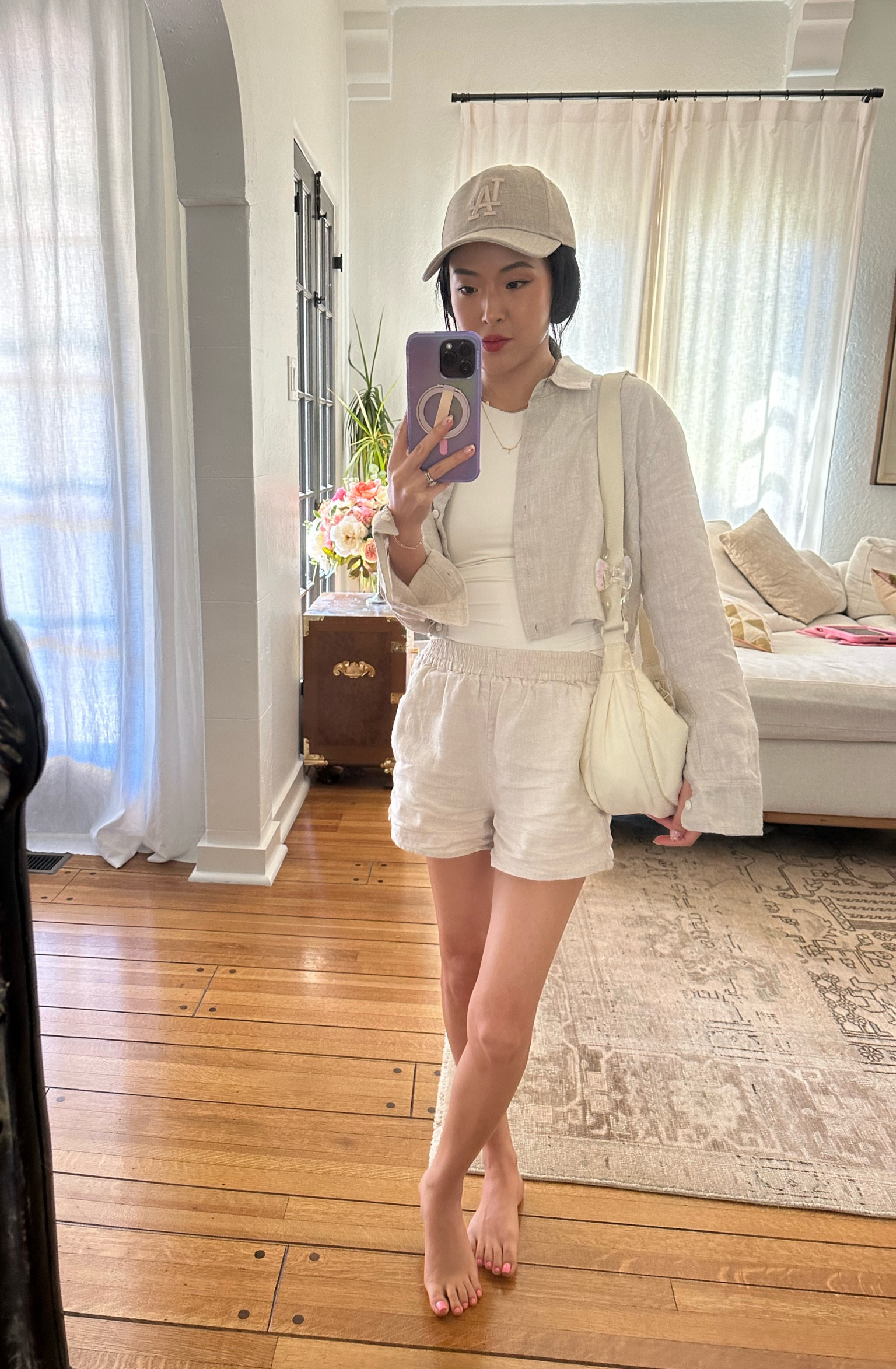 Breezy linen fit for hot days! LOVE this cropped button-up and this ball cap literally matches everything. As soon as it went on sale I hopped on it FAST! (PSA my whole outfit is currently on sale)

#LTKSaleAlert #LTKFindsUnder100 #LTKSummerSales