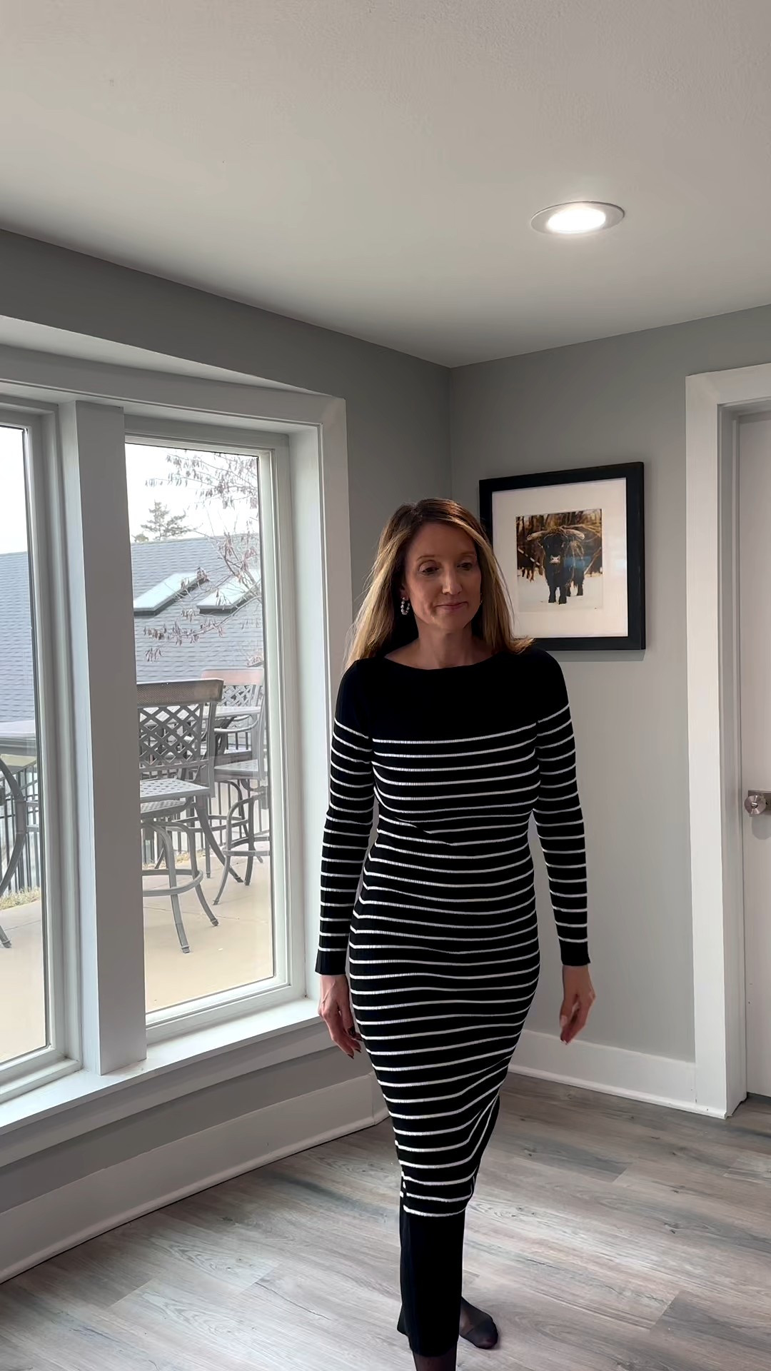 Transitioning a classic striped midi dress into the cooler months is all about high-contrast accessories that feel both intentional and polished. By pairing a sleek, body-con silhouette with structured white boots, you create an elevated look that is ready for a social afternoon or a winter-to-spring transition.
The Striped Transition Breakdown
• The Hero Piece: I’m wearing a black and white horizontal striped midi dress with long sleeves. The tight knit provides a streamlined, feminine shape while offering enough coverage for cooler weather.
• The High-Contrast Finish: I’ve styled the dress with white pointed-toe knee-high boots. Holding them up shows just how much the bright neutral pops against the dark stripes of the dress.
• The Silhouette: The midi length of the dress paired with the tall boots creates a continuous, sophisticated line that is a secure staple for any modern wardrobe. @VICI dress and boots @rebeccaminkoff leather jacket 

If you’re looking for a sign to break out your white accessories, this is it. 🧥✨ I paired this classic striped long-sleeve dress with knee-high boots for a social afternoon that feels completely elevated. It’s all about those small, intentional luxuries—like a perfect boot-and-midi combo—that make your transition wardrobe pop! Tap the link in my bio to snag these closet favorites. 🌟👢 #StyleInspo #MidiDressStyle #MonochromeLook #LTKfind

black and white striped midi dress, white knee-high leather boots, long-sleeve body-con dress, pointed-toe white boots, horizontal striped fashion, feminine transition style, monochrome outfit ideas, intentional wardrobe staples, winter-to-spring dress, @VICI 



#LTKootd #LTKOver40 #LTKgrwm

#LTKootd #LTKOver40 #LTKSeasonal