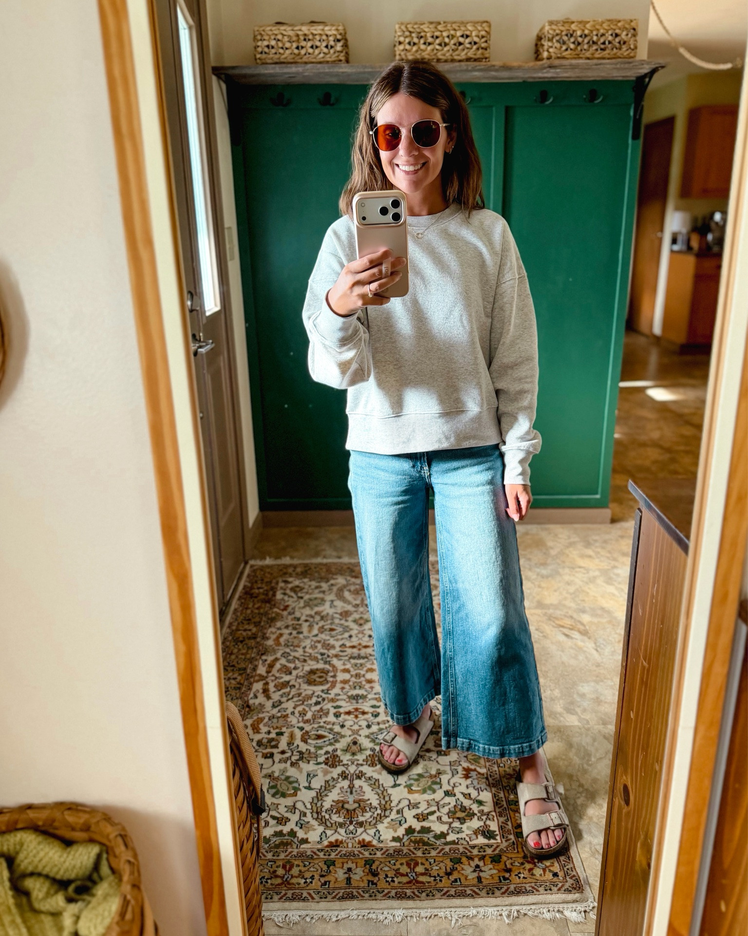 Easy early fall look with a grey crewneck sweatshirt and wide leg jeans! 

Xs in my crewneck sweatshirt, 24 short/petite in my jeans and 36 in my sandals 🫶🏽

#LTKSeasonal #LTKPetite #LTKootd